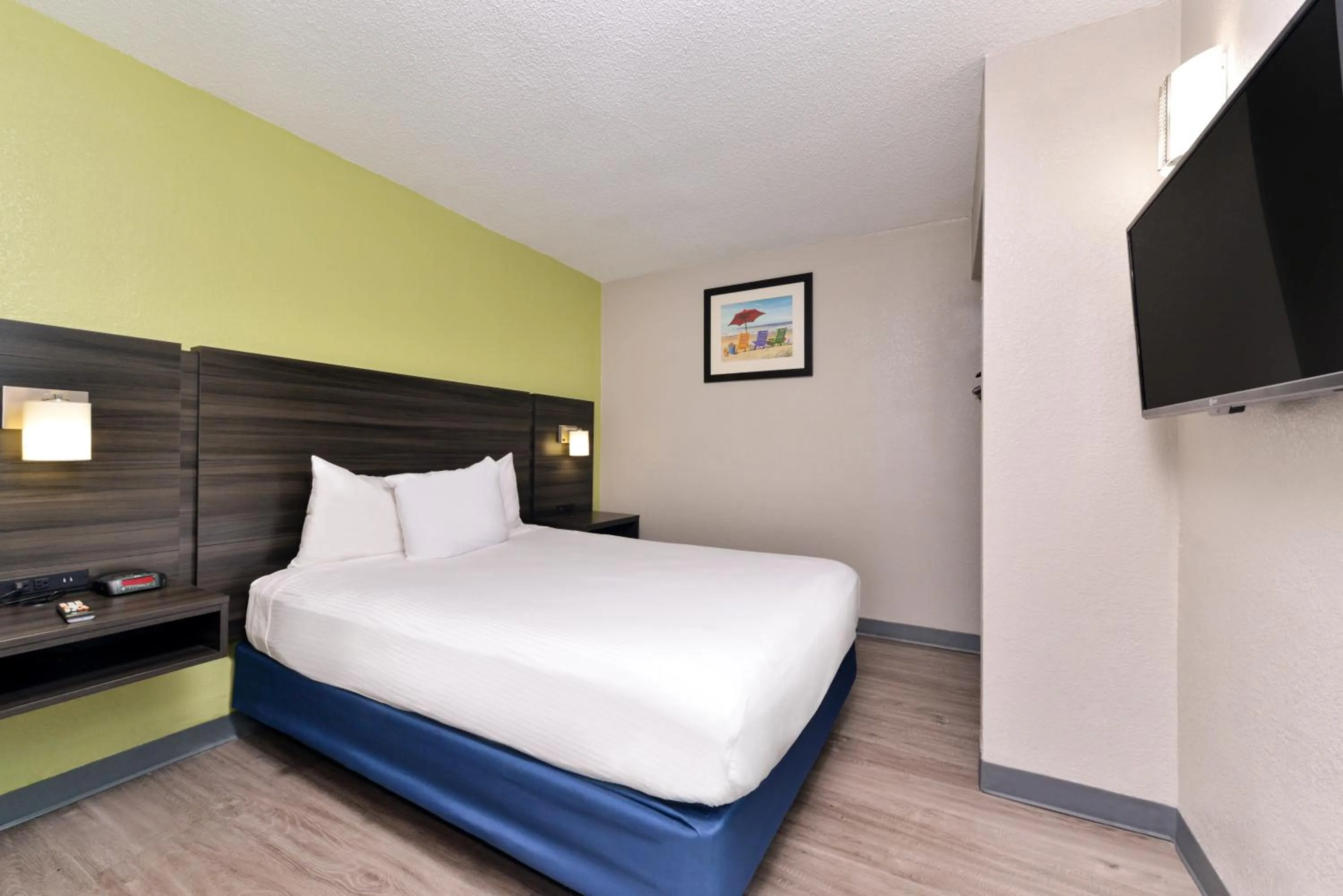 Bed in SureStay Studio by Best Western Virginia Beach Oceanfront