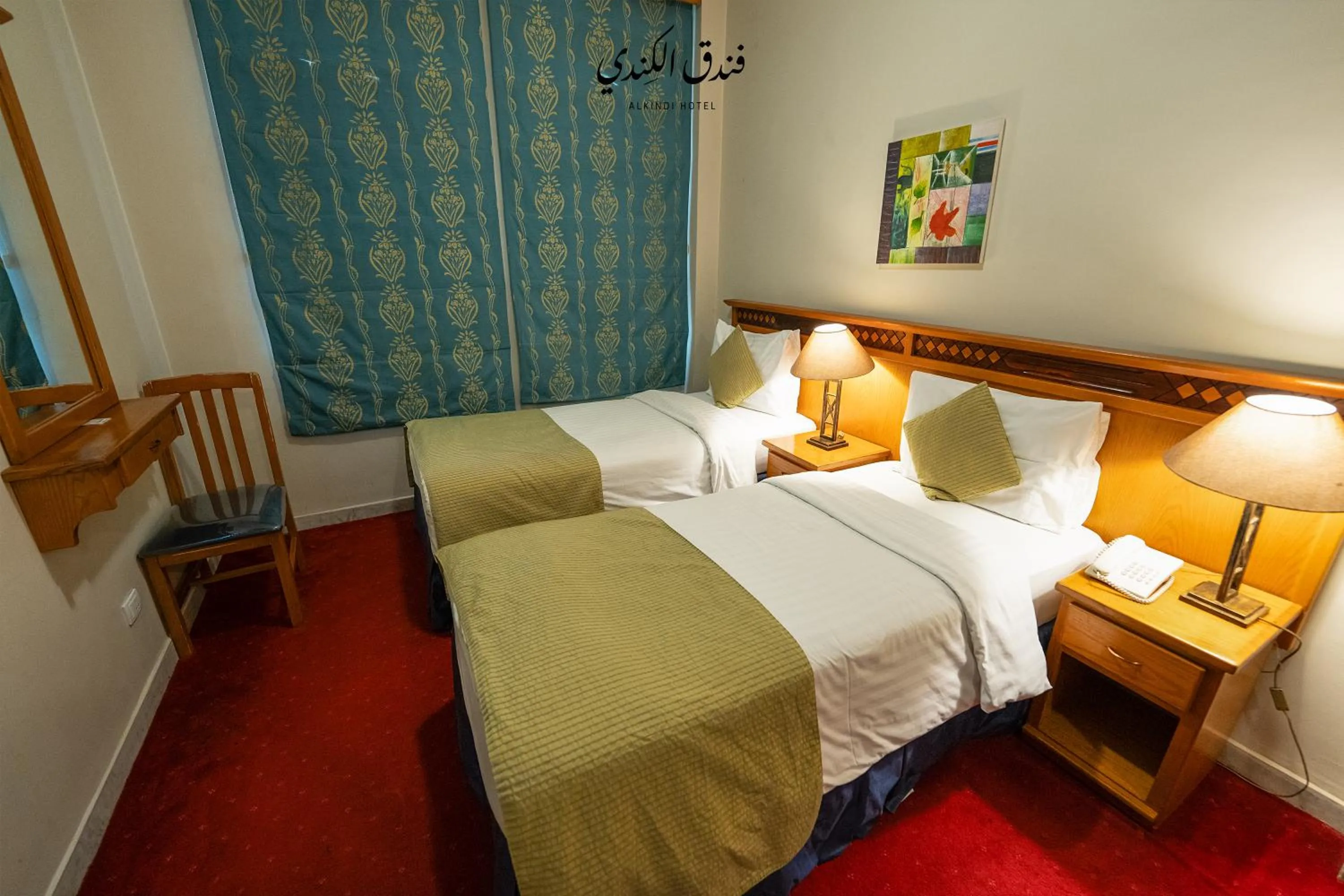 Bed in Kindi Suite Hotel