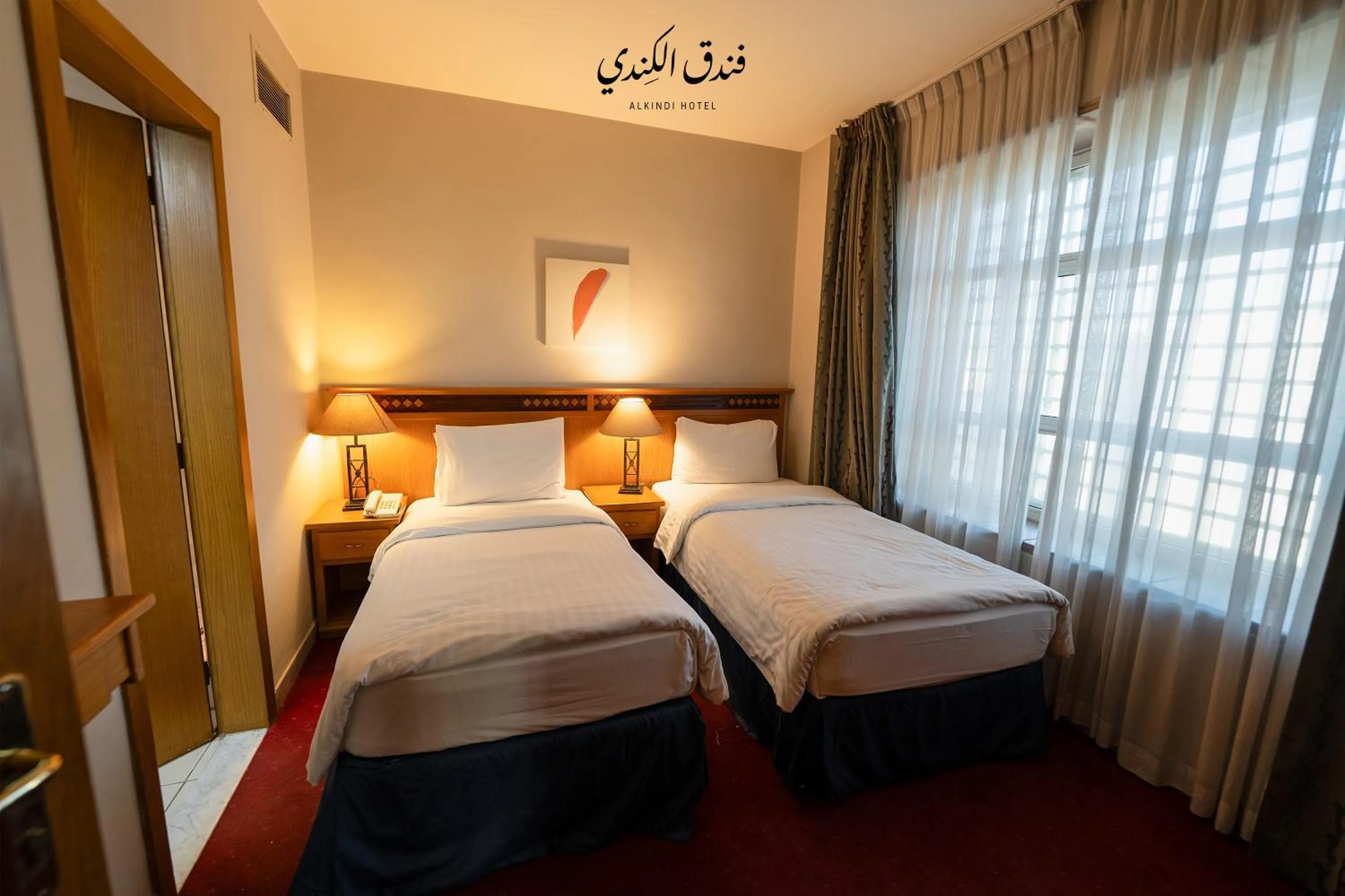 Bed in Kindi Suite Hotel