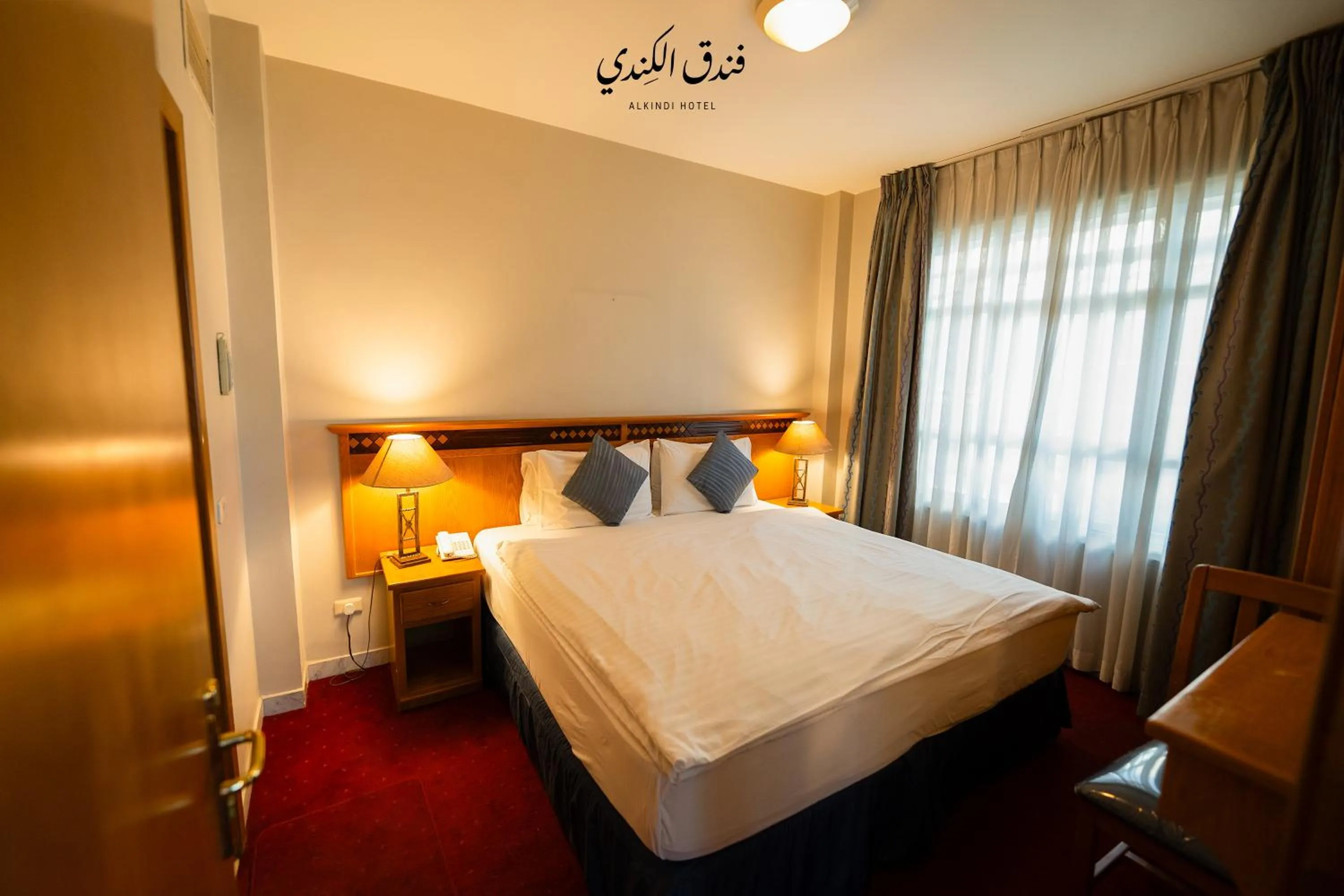 Bed in Kindi Suite Hotel