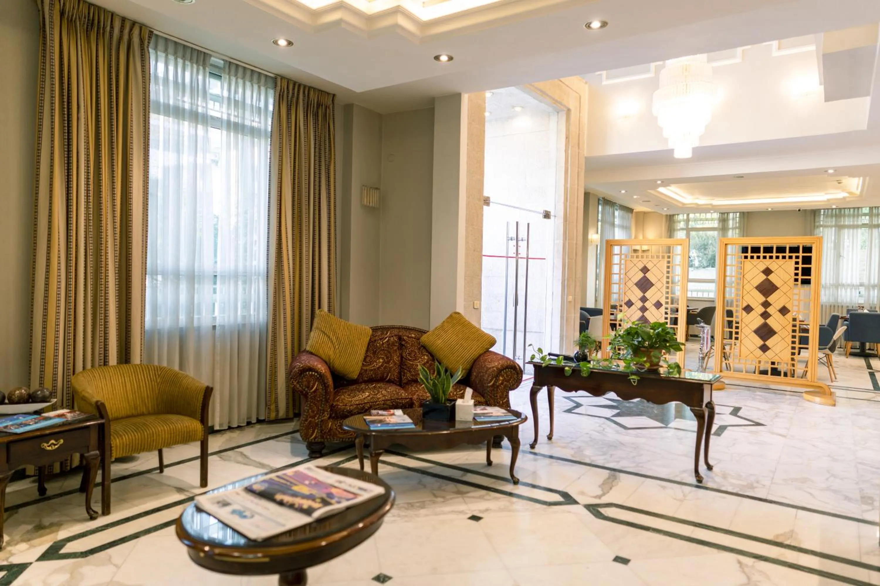 Lobby or reception in Kindi Suite Hotel