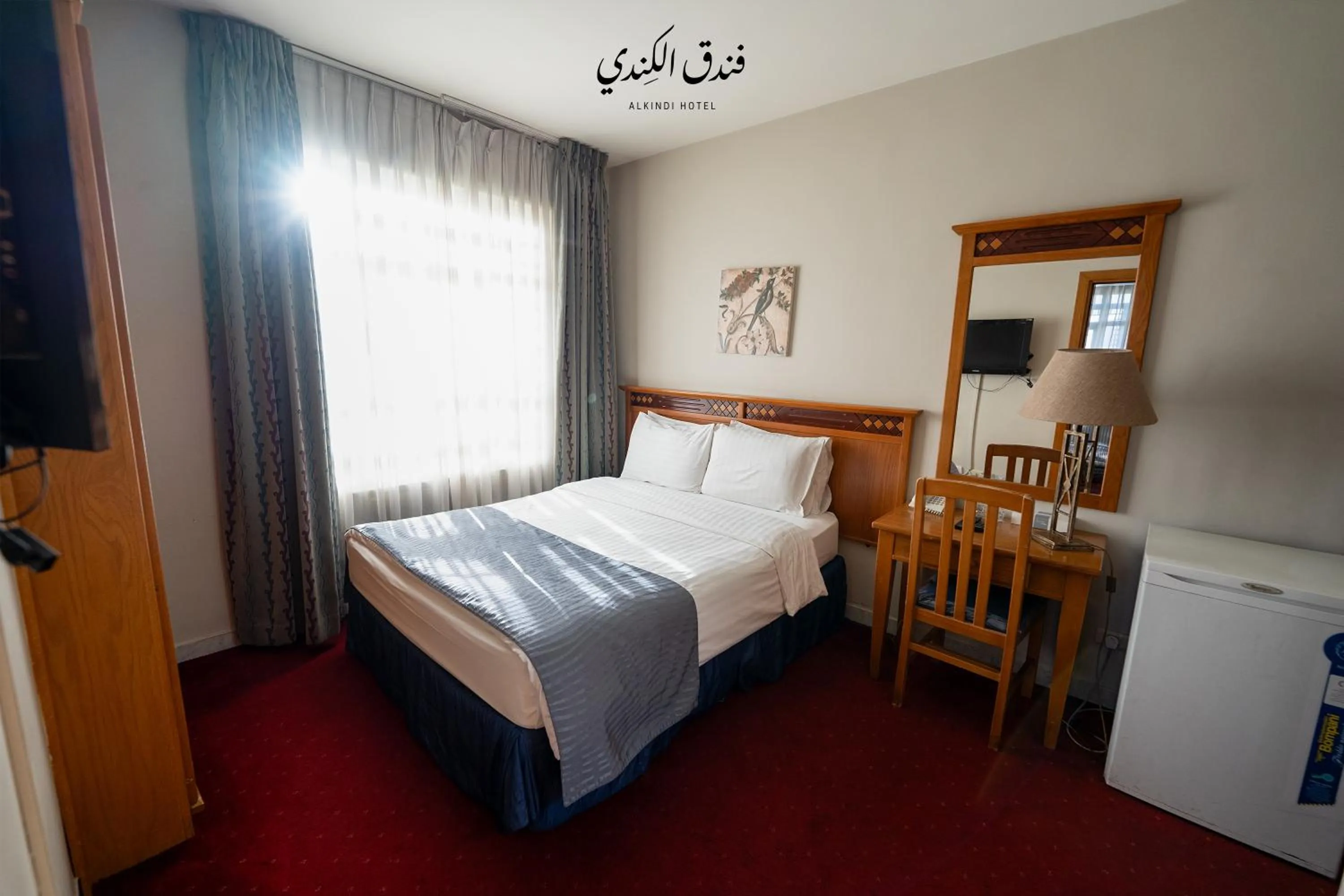 Bed in Kindi Suite Hotel