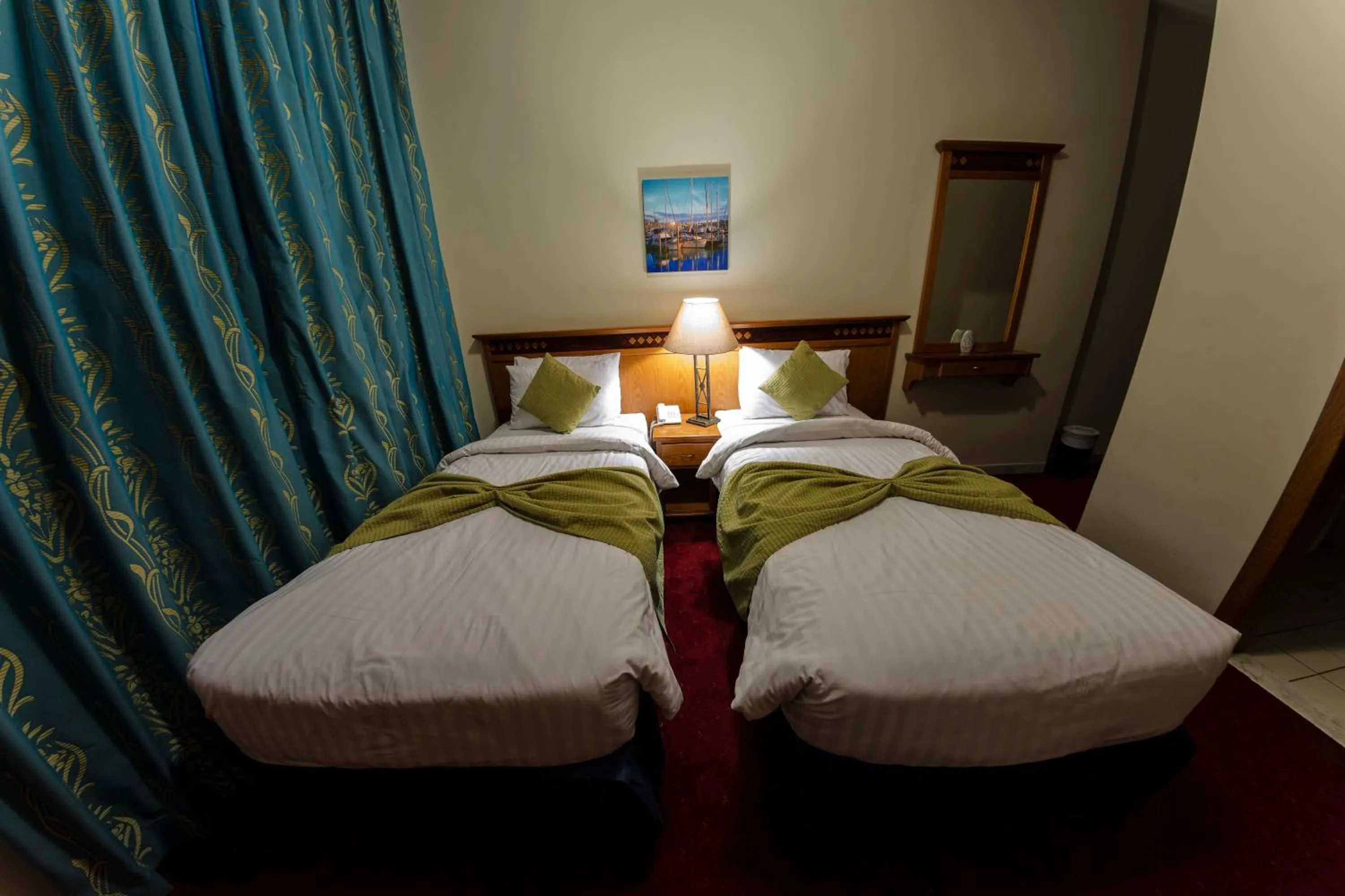 Bed in Kindi Suite Hotel