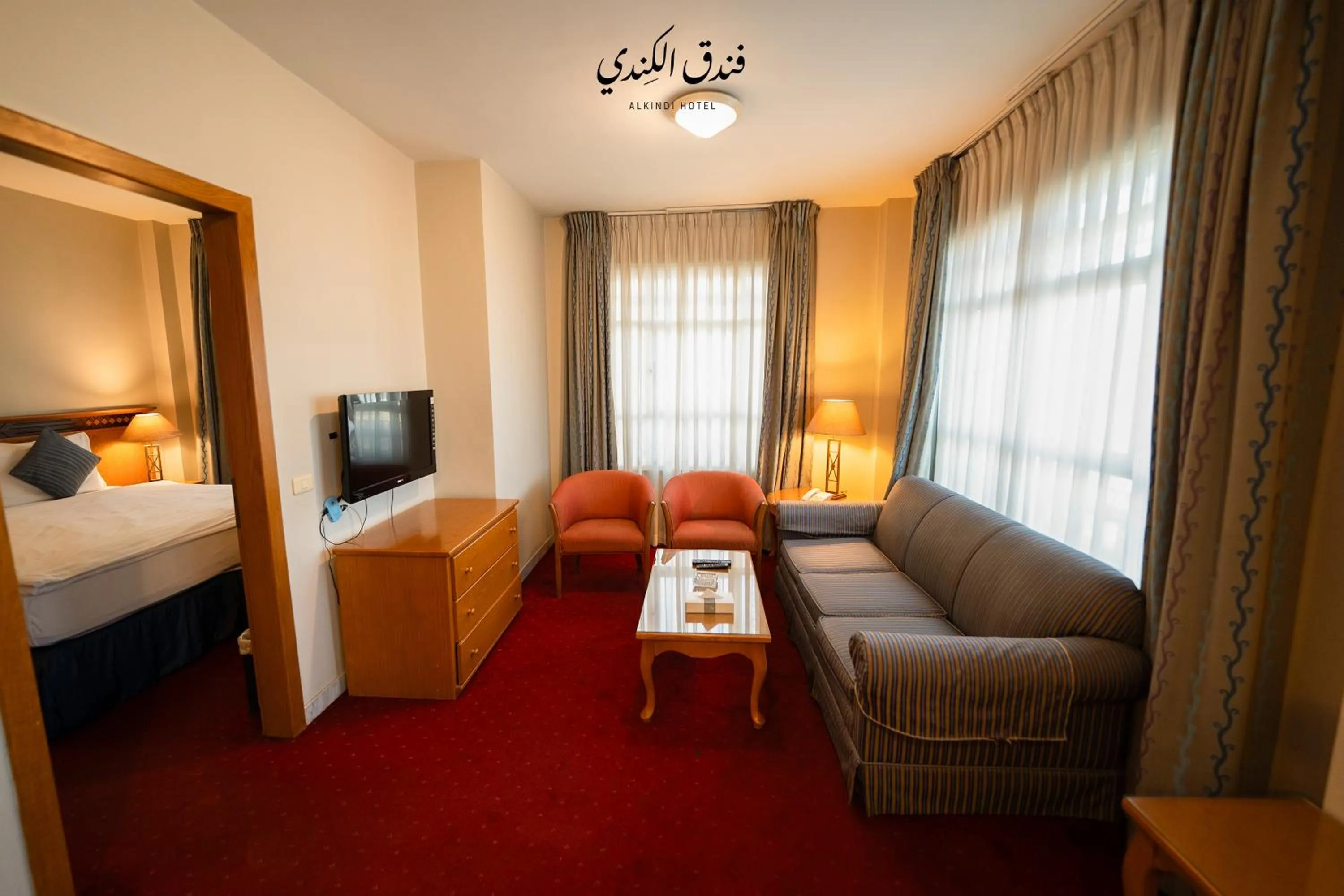 Bed in Kindi Suite Hotel