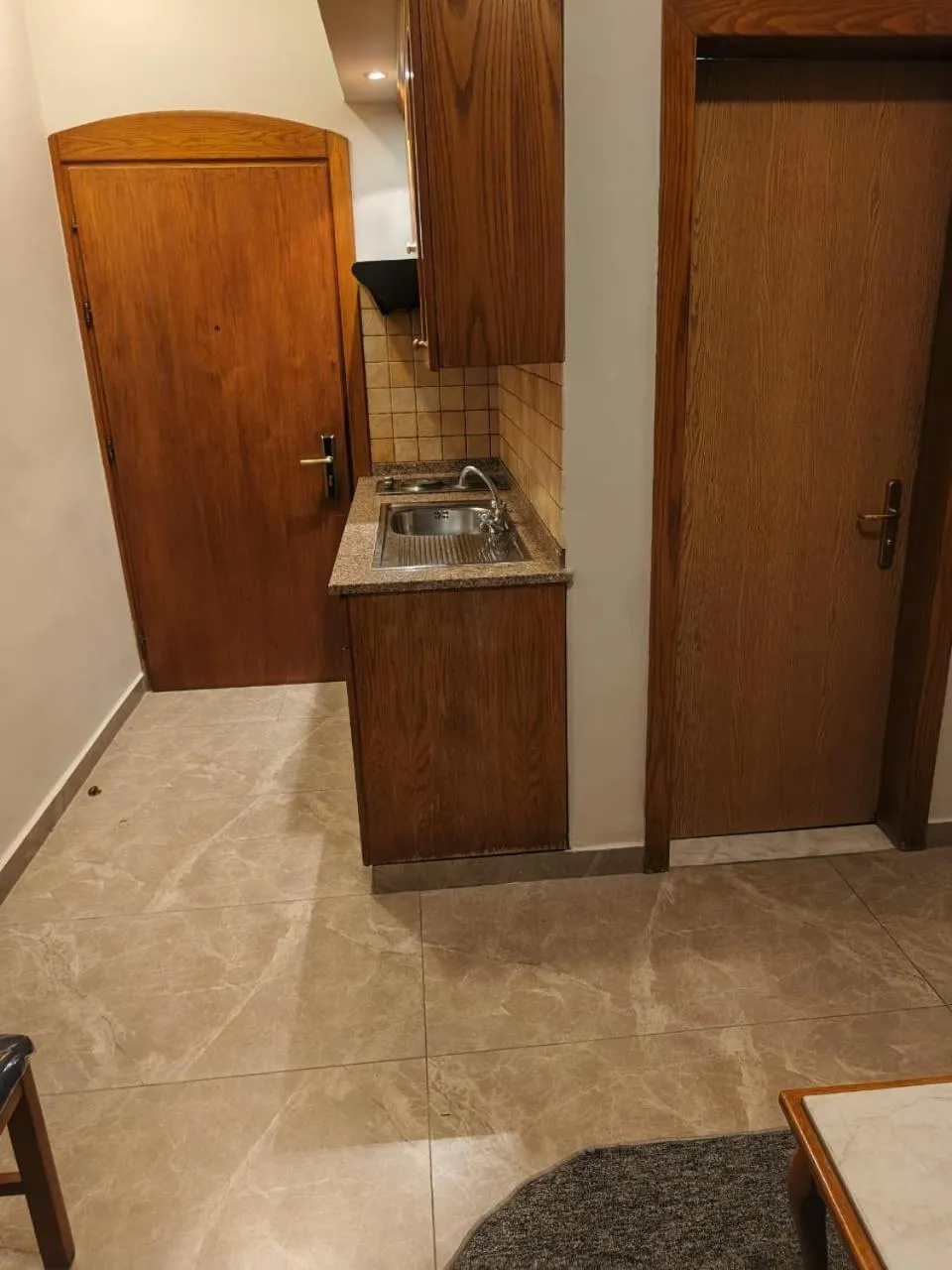 Kitchen or kitchenette in Kindi Suite Hotel