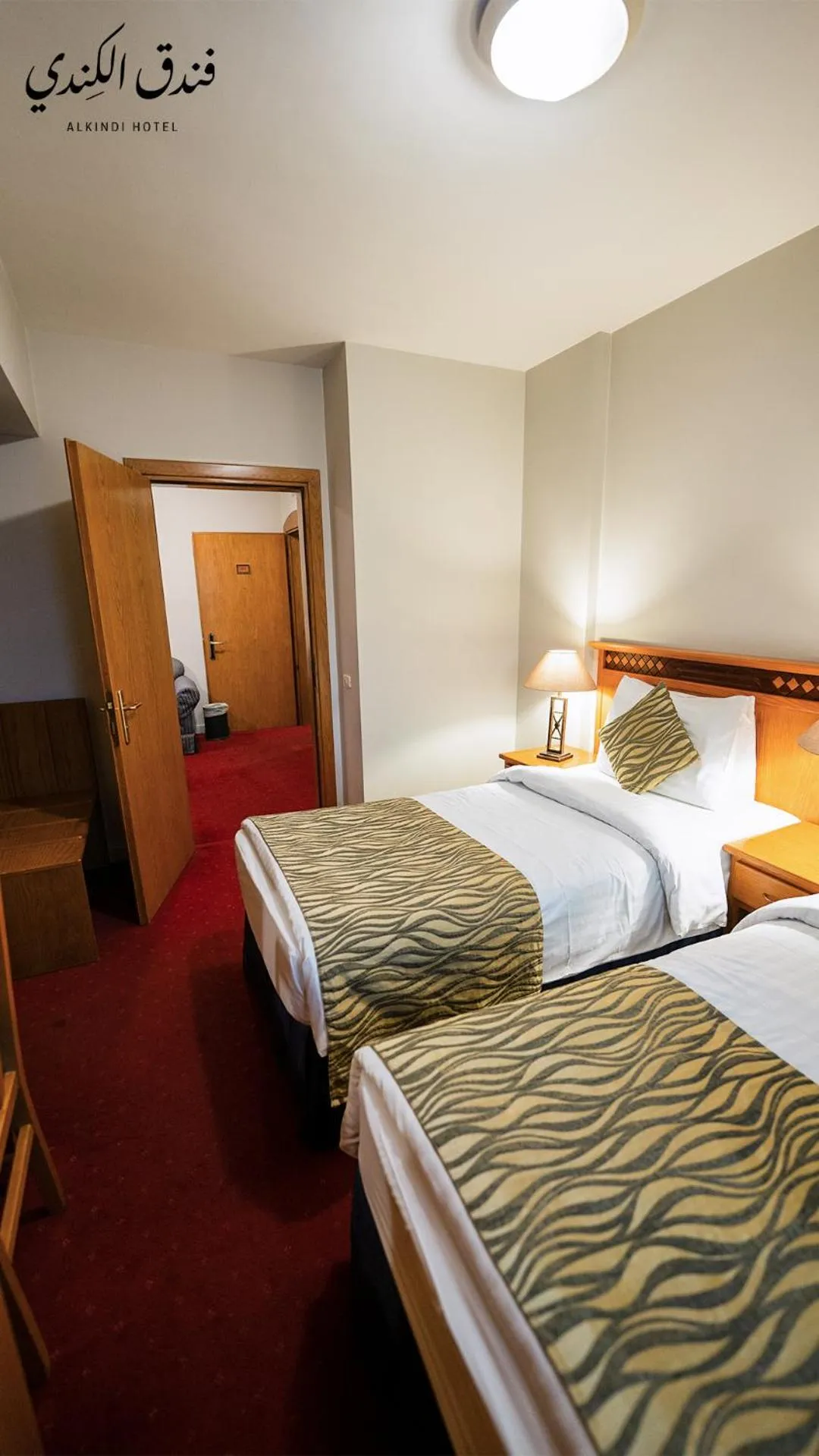 Bed in Kindi Suite Hotel