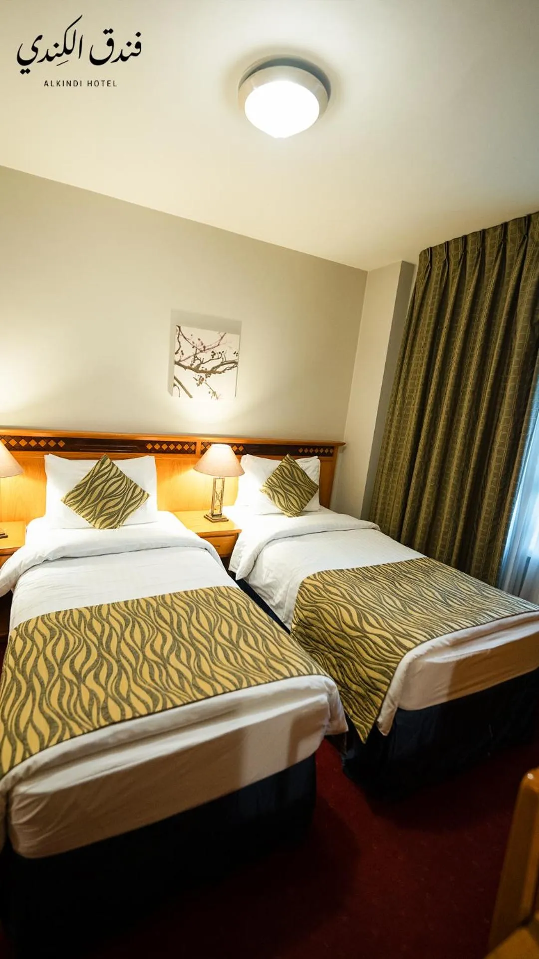 Bed in Kindi Suite Hotel