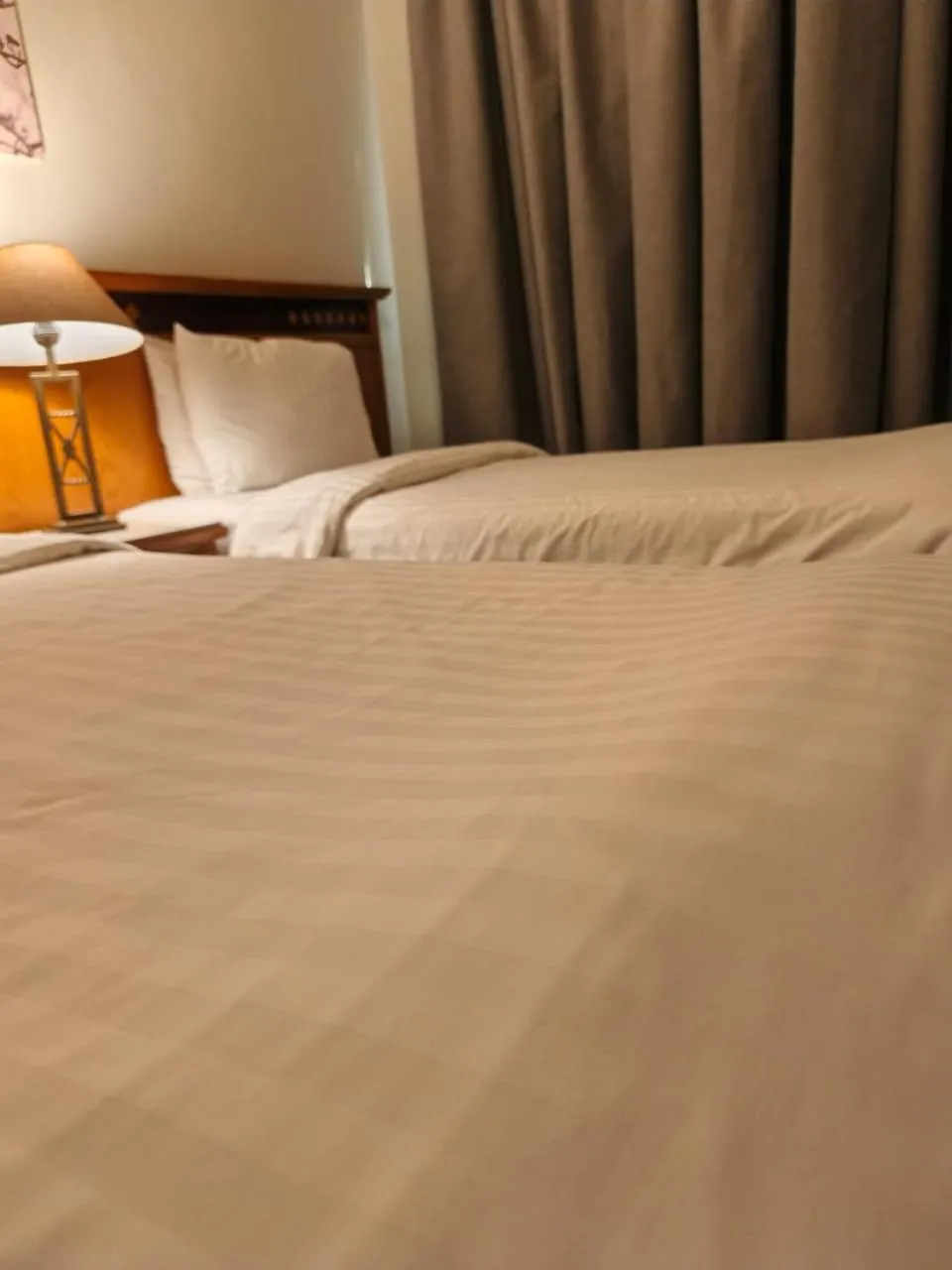 Bed in Kindi Suite Hotel