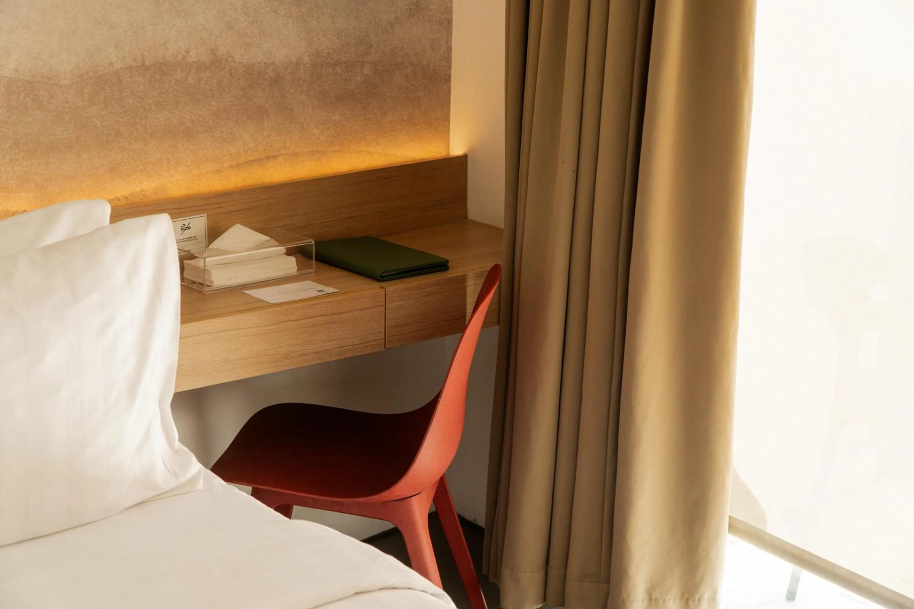 Bed in Malaka Hotel Bandung