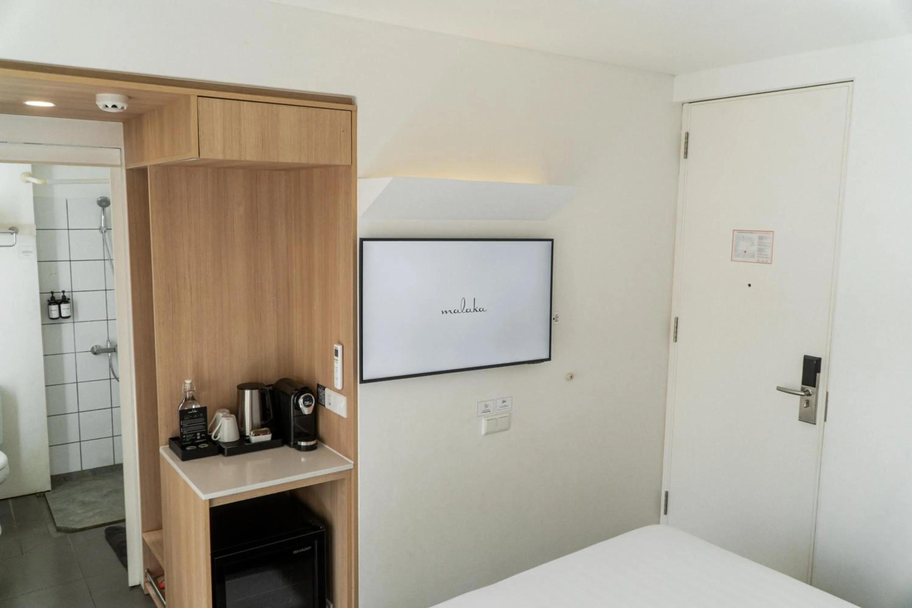 Bed in Malaka Hotel Bandung