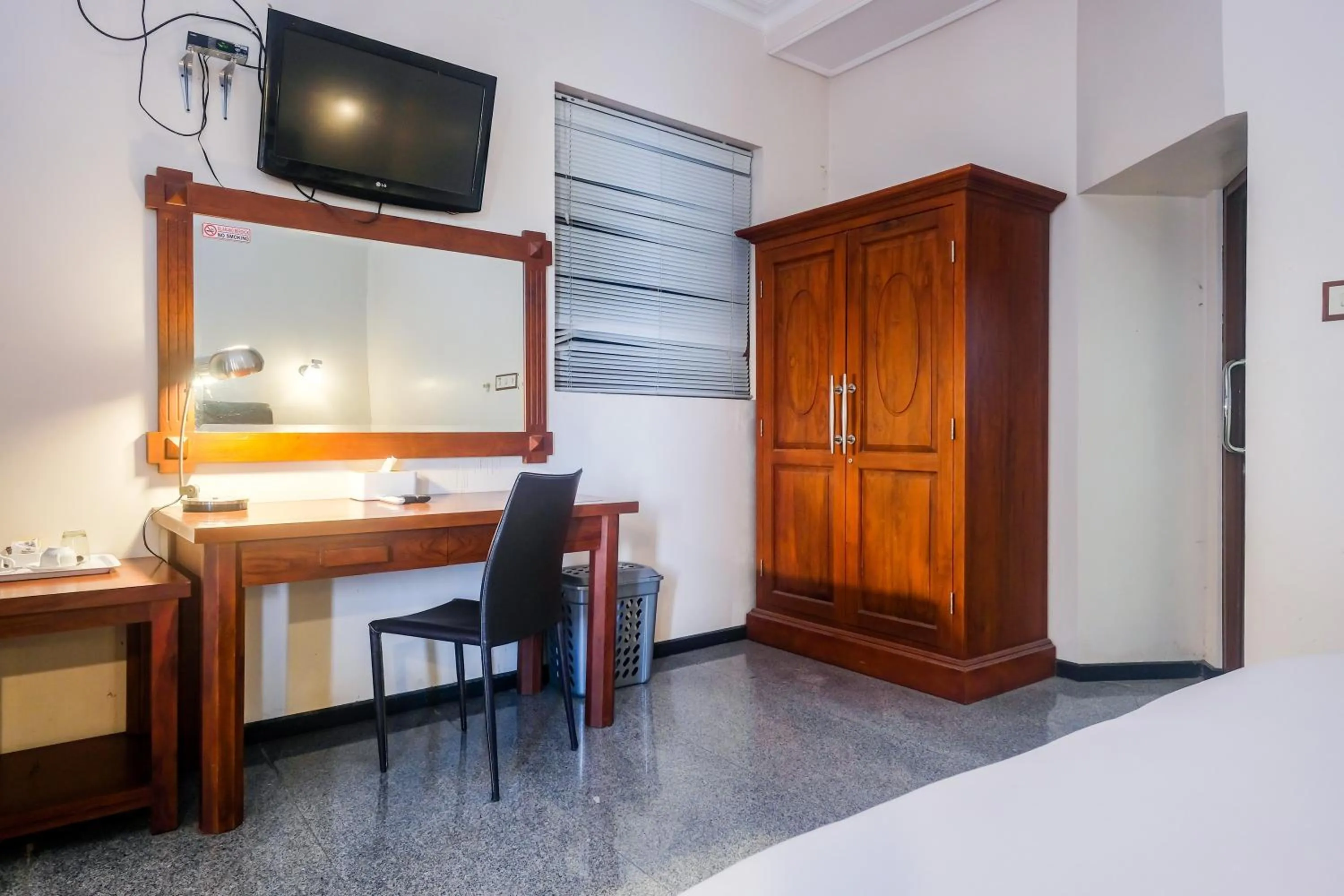 Bedroom in Urbanview Omah Pari Boutique Hotel