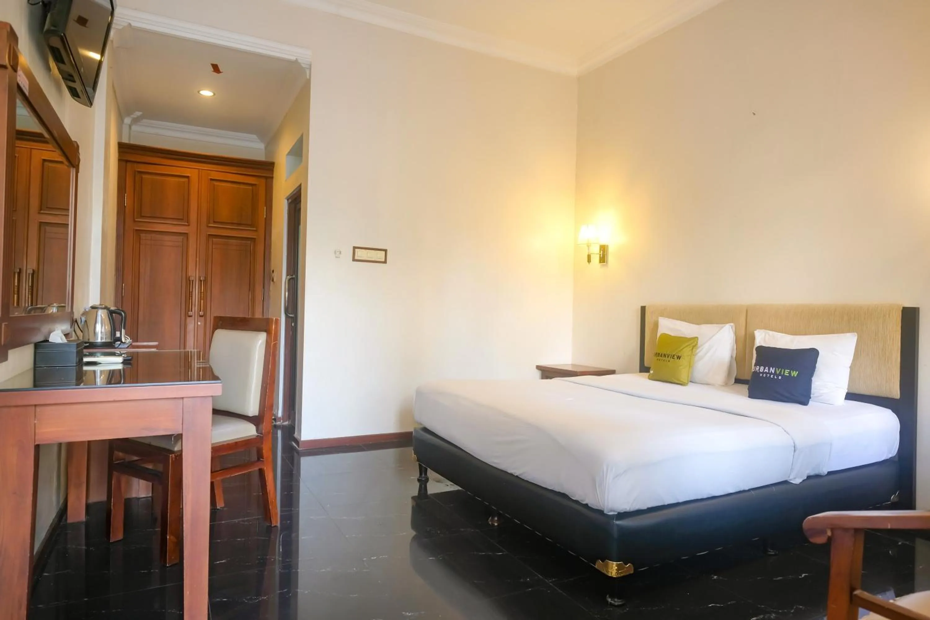 Bedroom, Bed in Urbanview Omah Pari Boutique Hotel