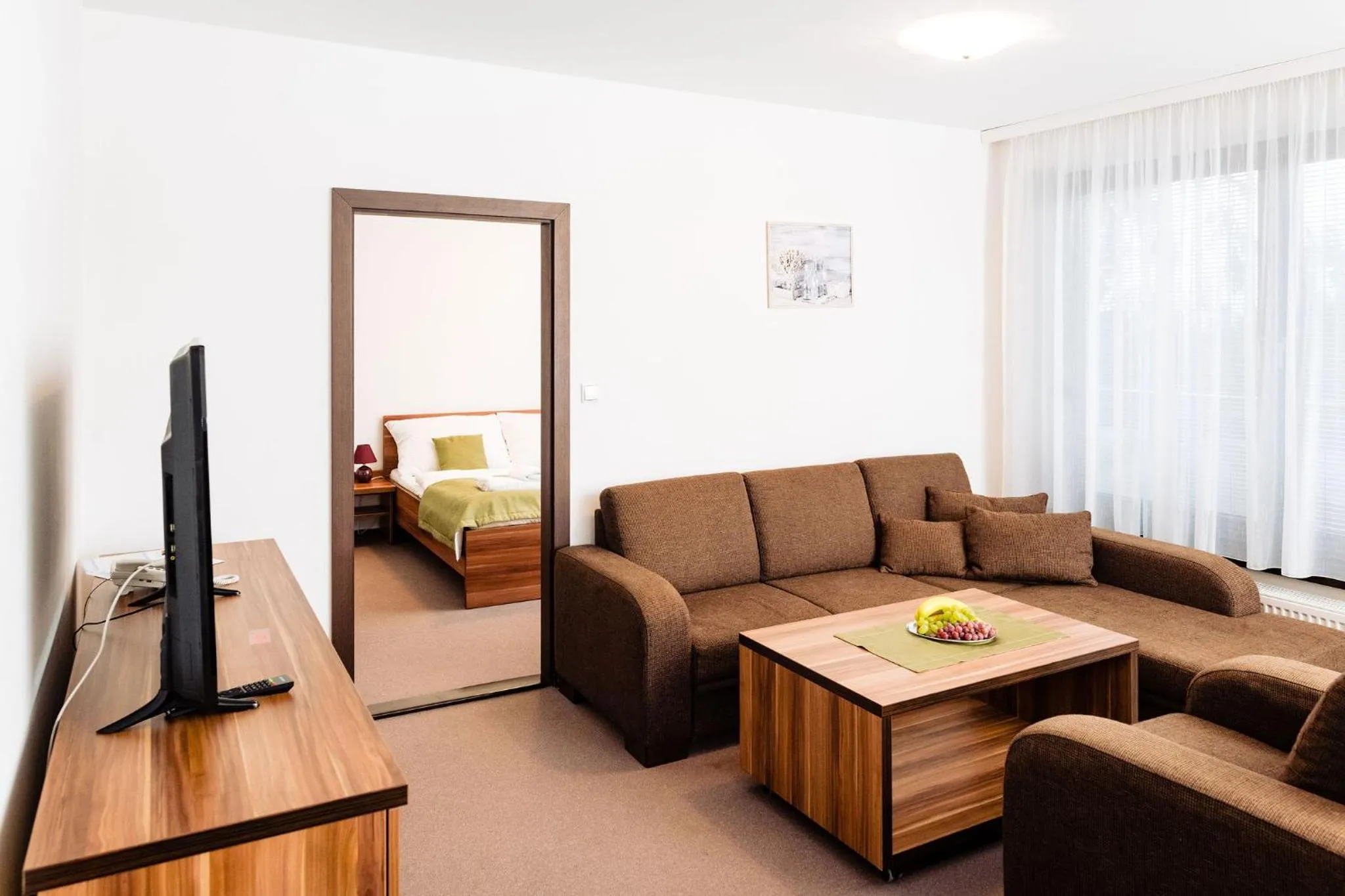 Communal lounge/ TV room in Apartmanovy dom Familia Smokovec