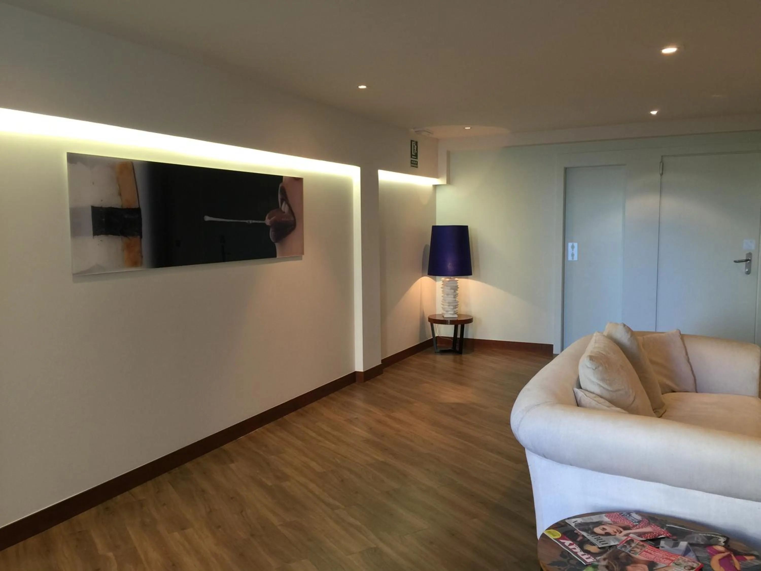 Communal lounge/ TV room in Hotel Lino