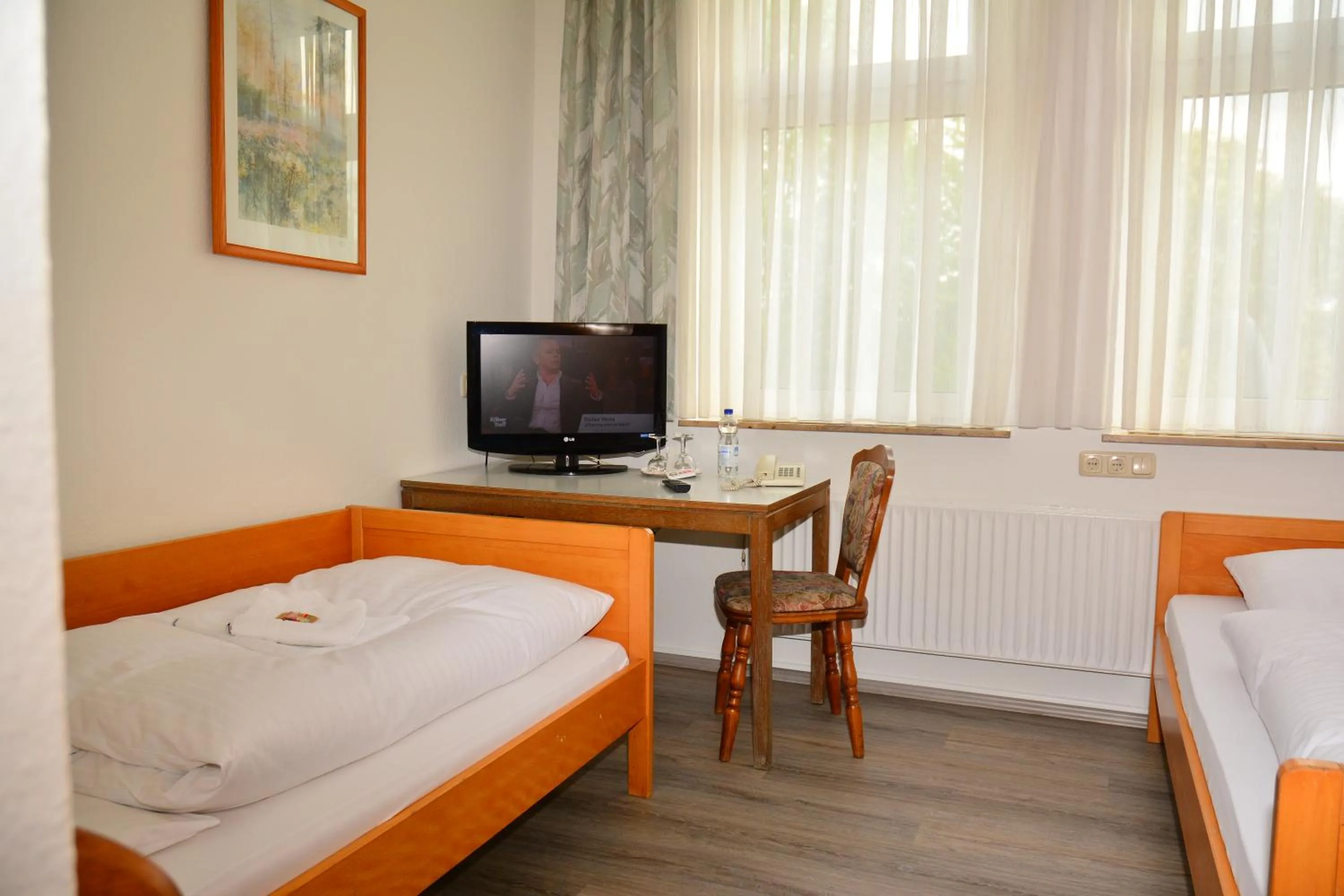 Photo of the whole room, Bed in Hotel Wilhelmshöhe