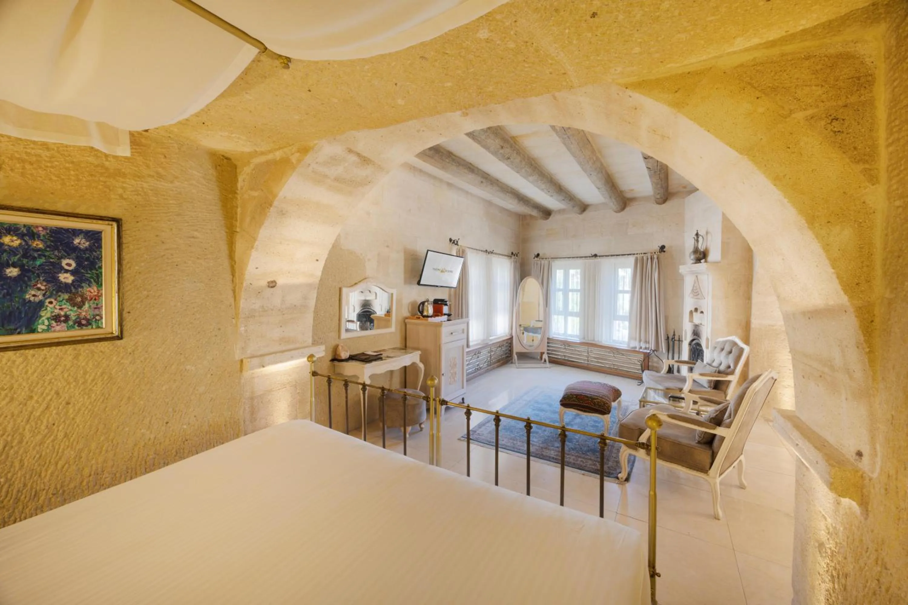 Lobby or reception, Bed in Tafoni Houses Cave Hotel