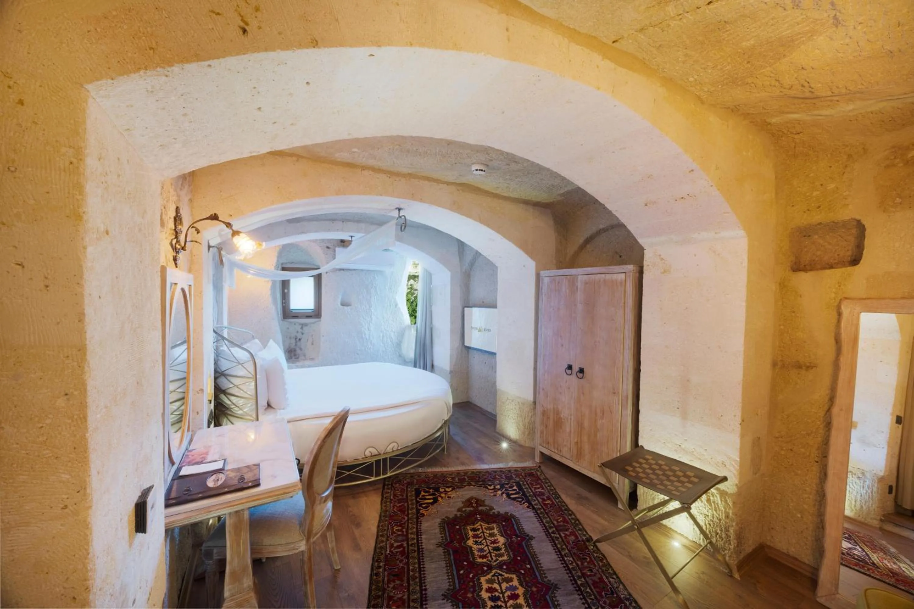 Lobby or reception, Bed in Tafoni Houses Cave Hotel