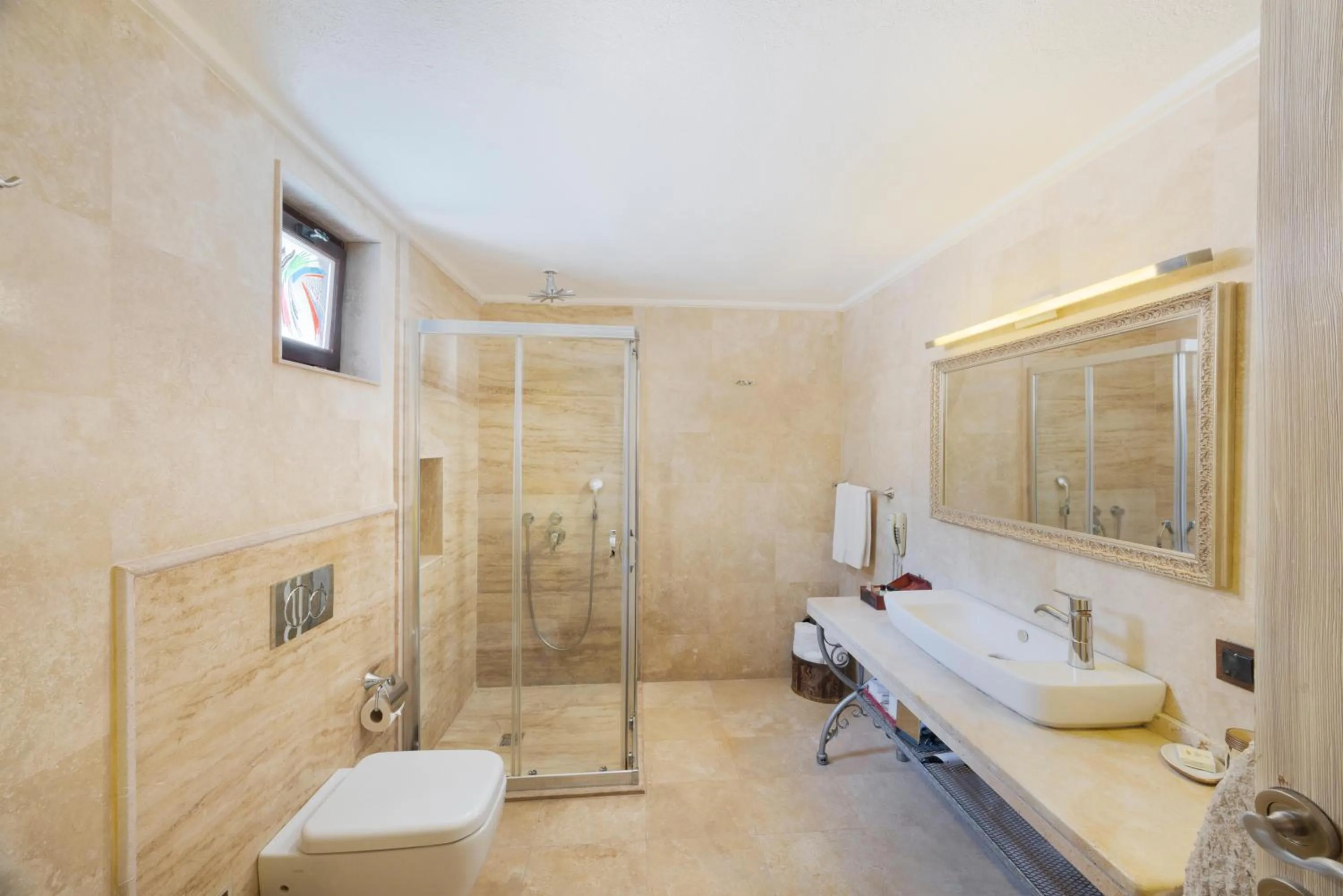 Shower in Tafoni Houses Cave Hotel