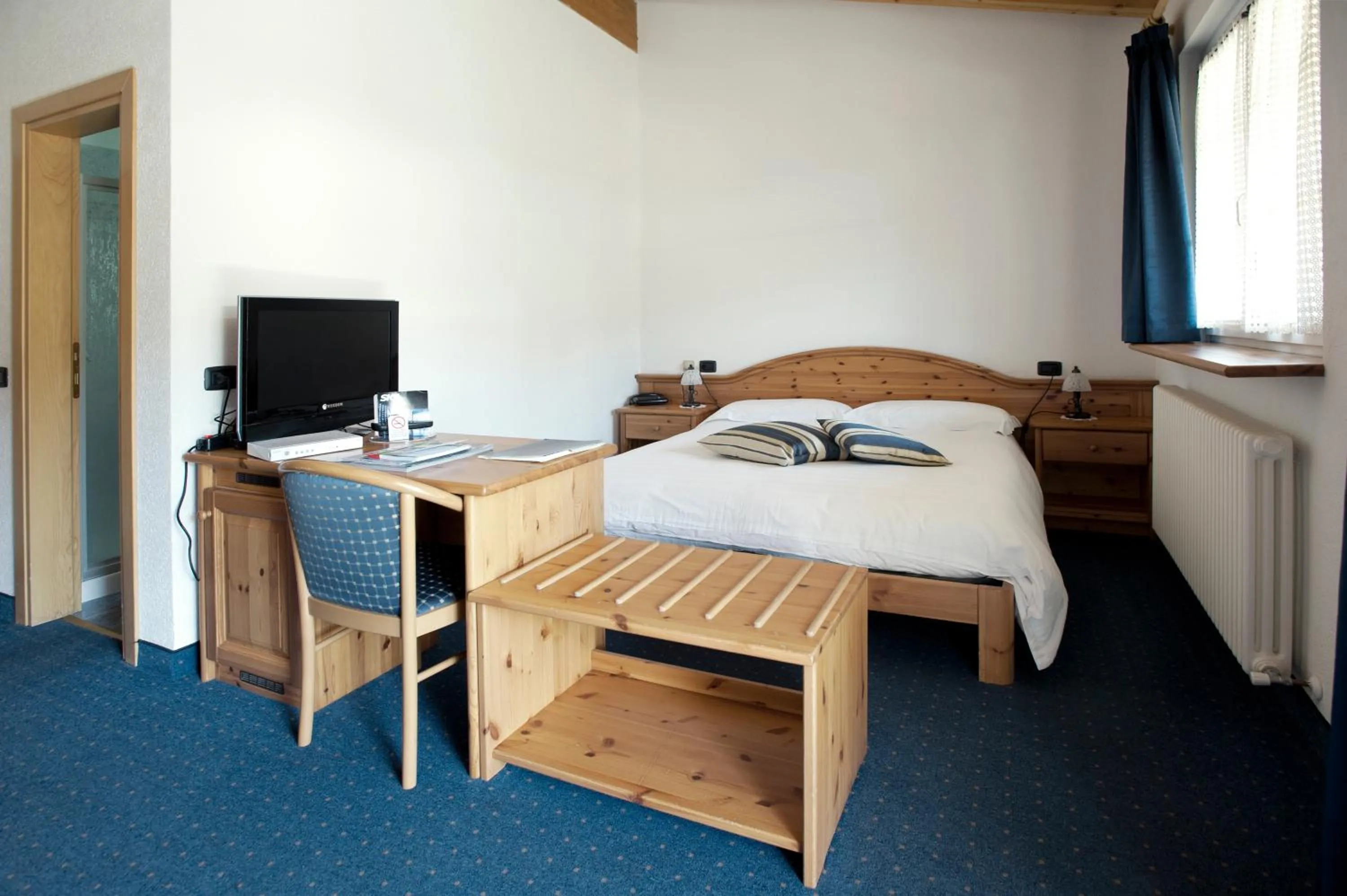 Bed in Sport Hotel Alpina