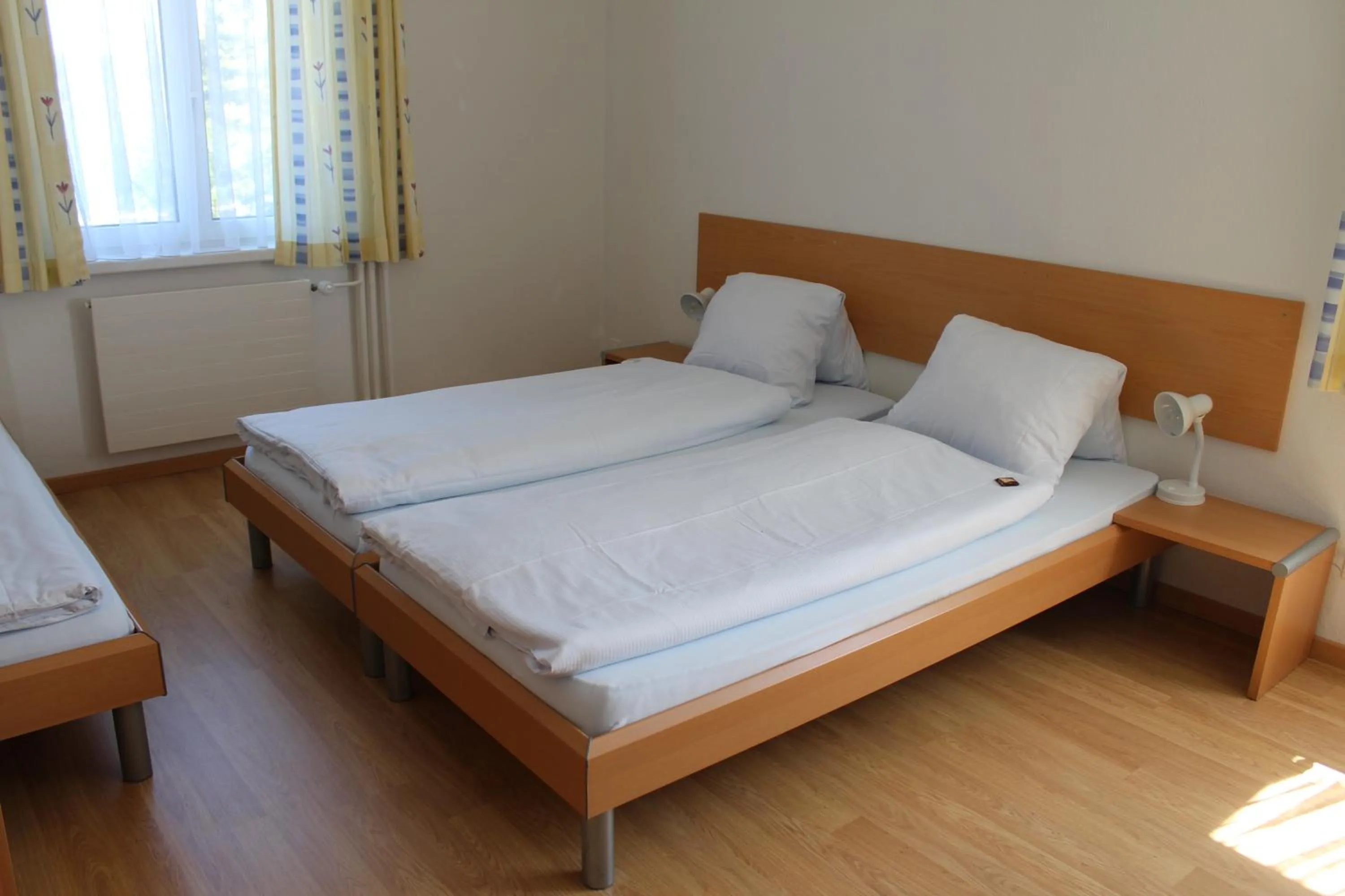 Bed in Hotel Glärnisch Hof