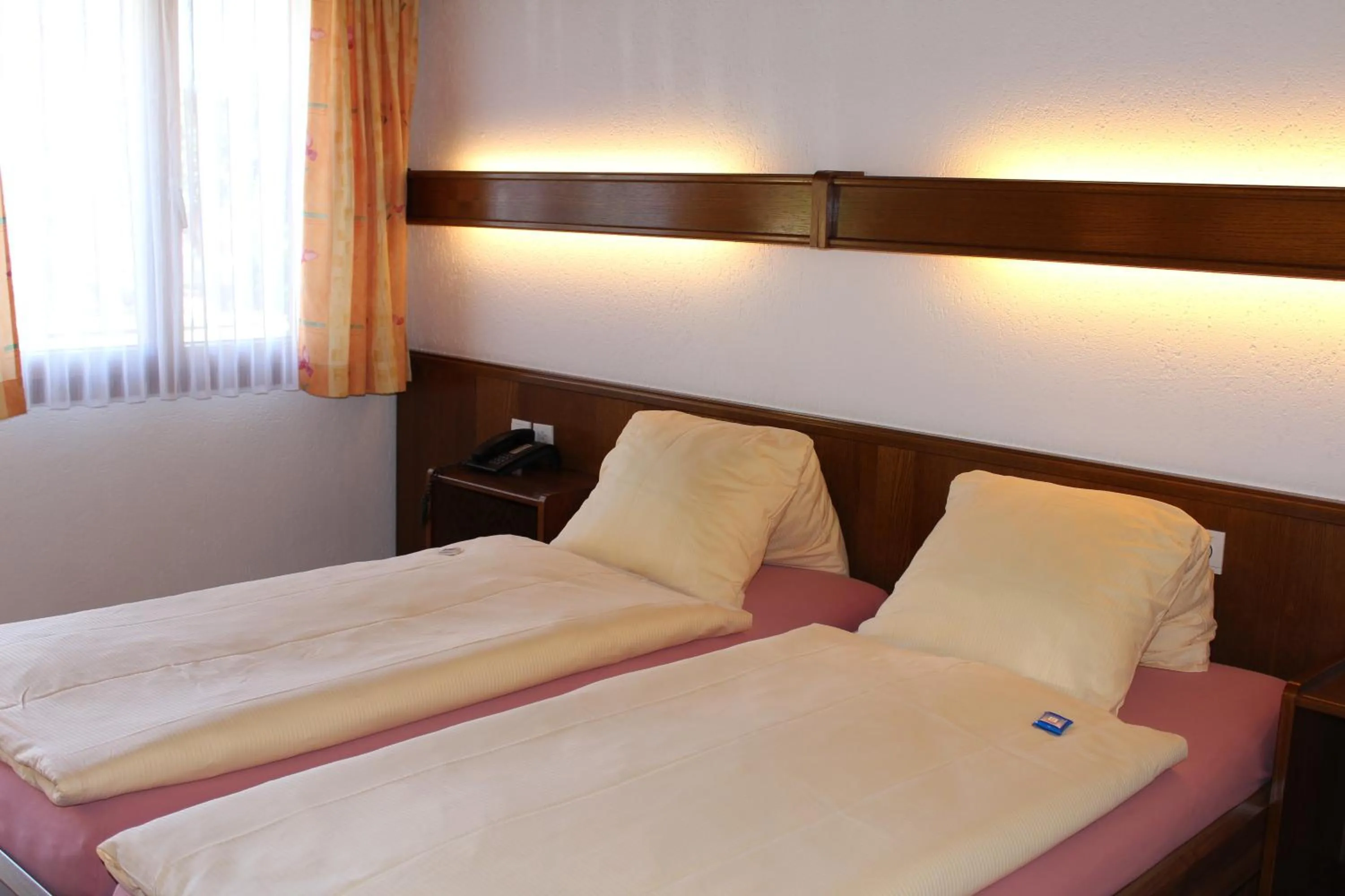 Bed in Hotel Glärnisch Hof