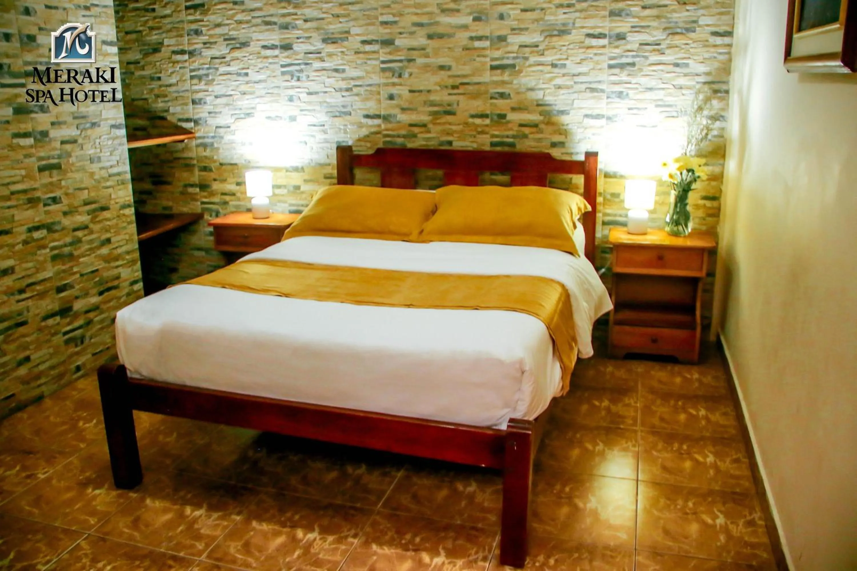 Bed in Meraki Hotel