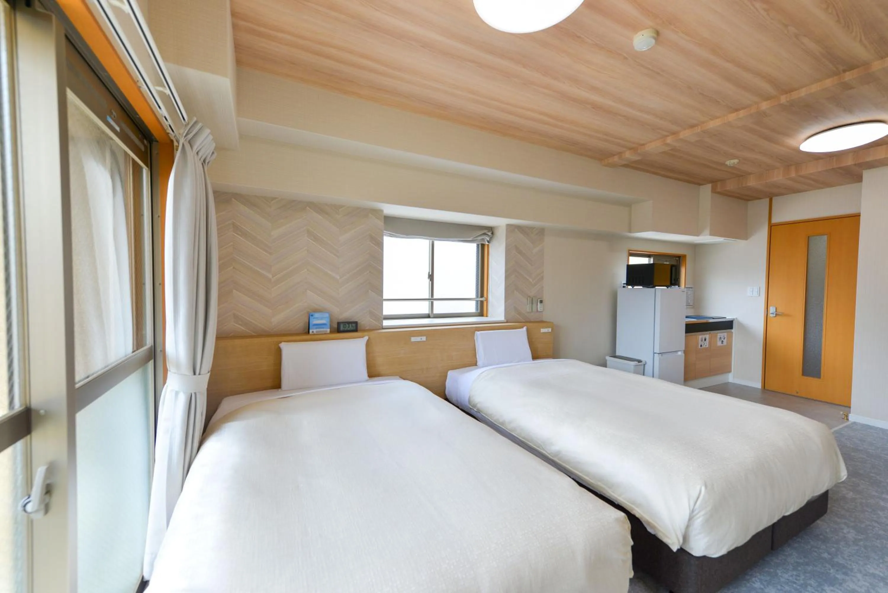 Photo of the whole room, Bed in Hotel New Gaea Yakuin