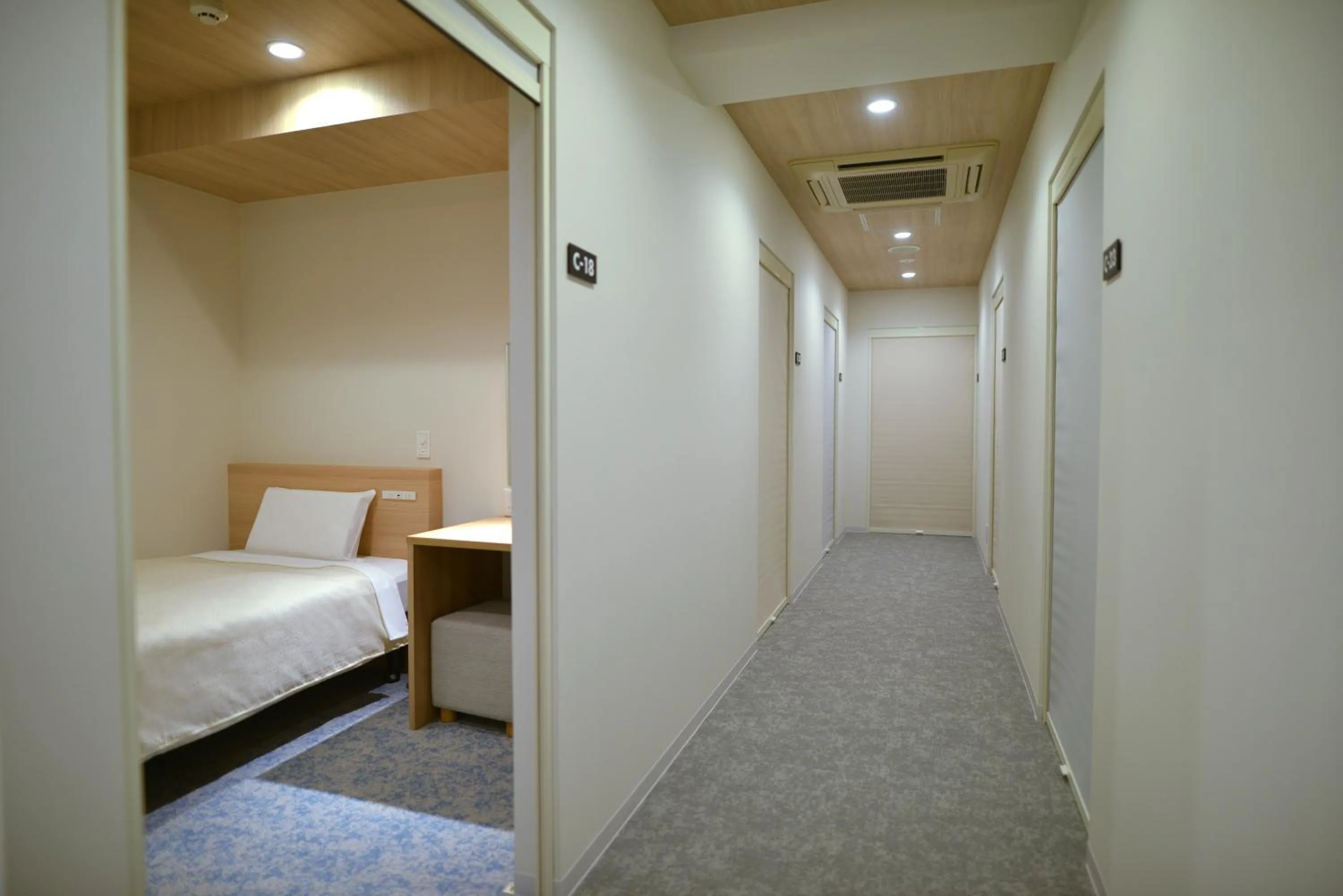 Photo of the whole room, Bed in Hotel New Gaea Yakuin