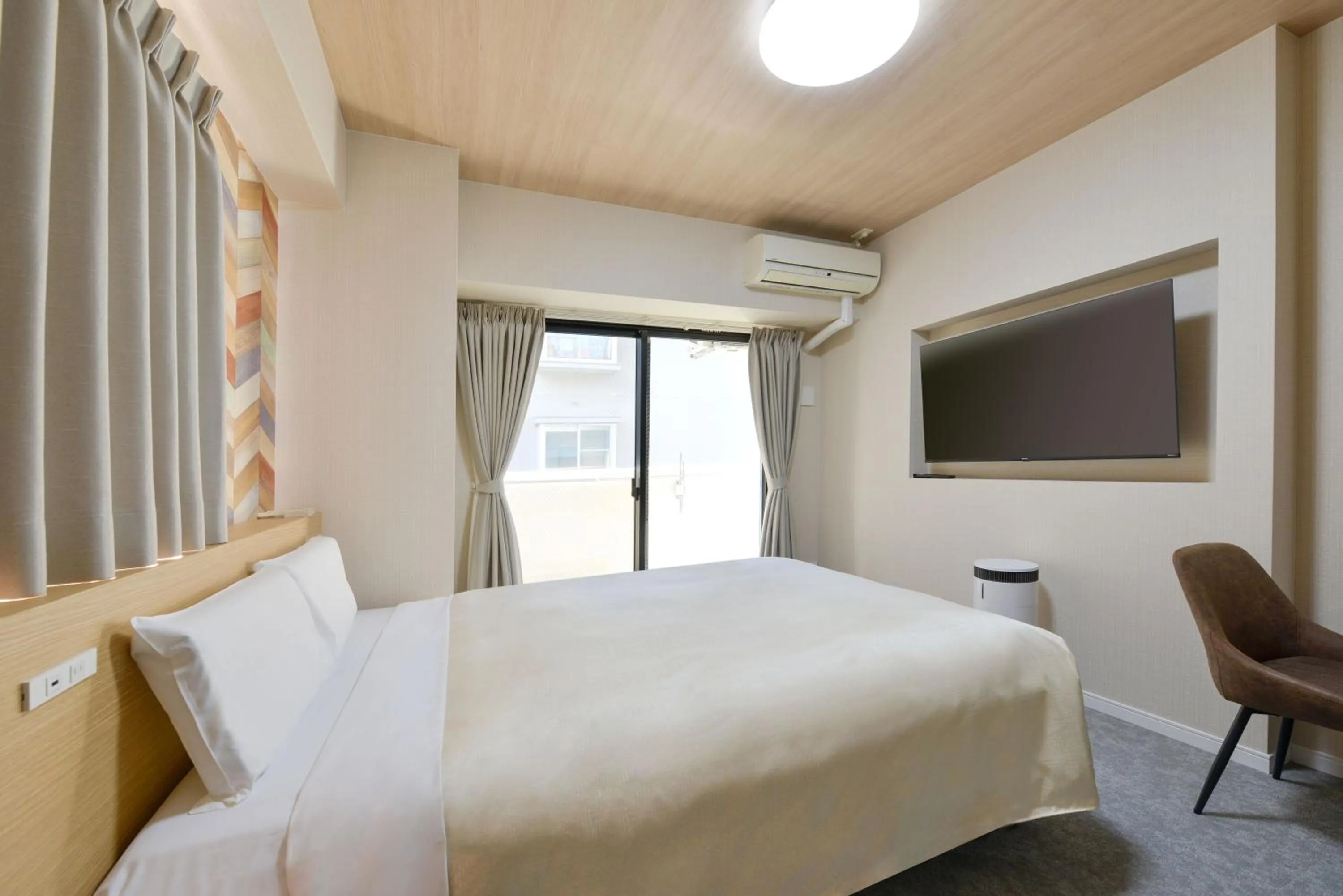 Photo of the whole room, Bed in Hotel New Gaea Yakuin