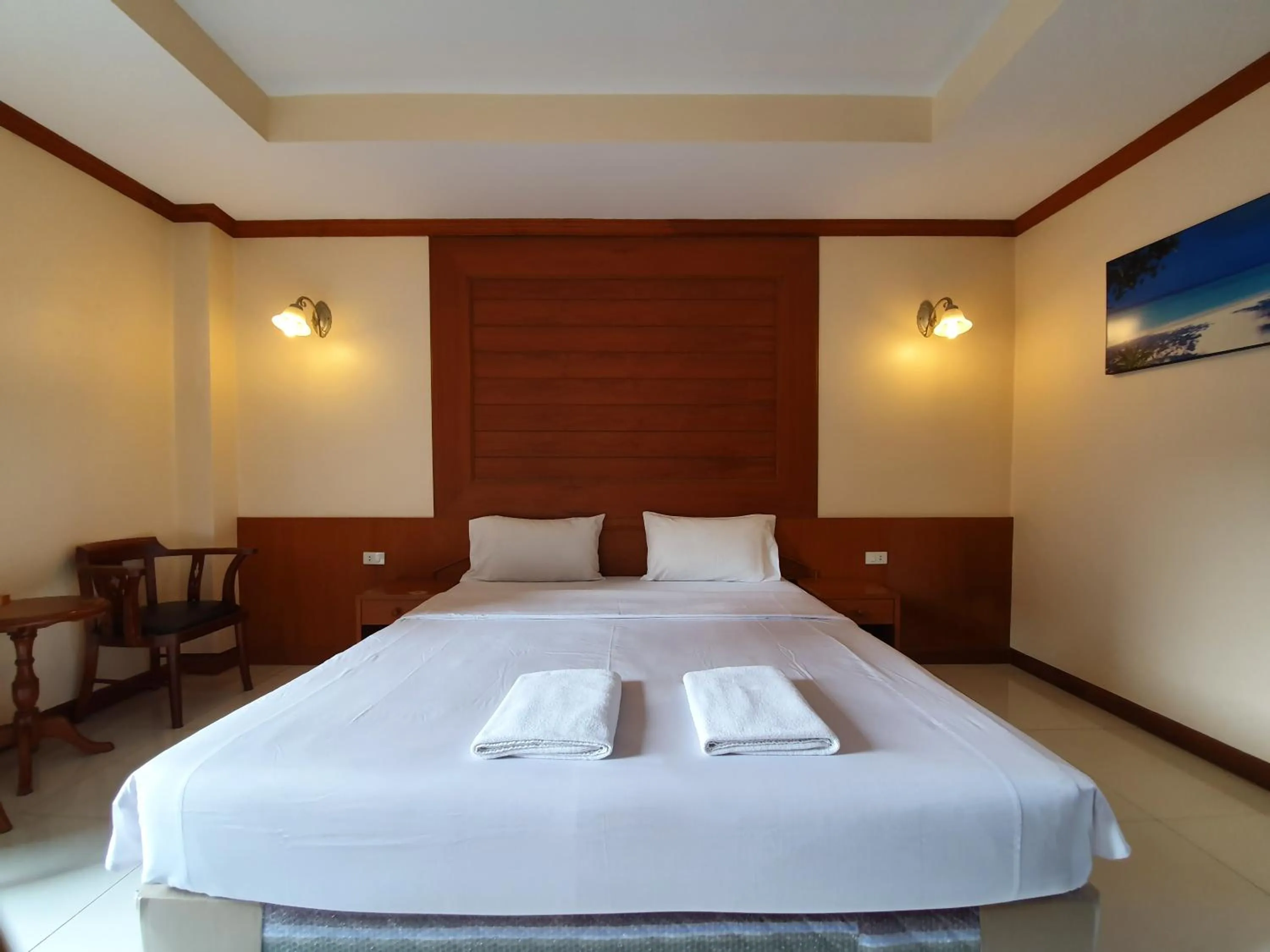 Bed in Baan JPN Hotel