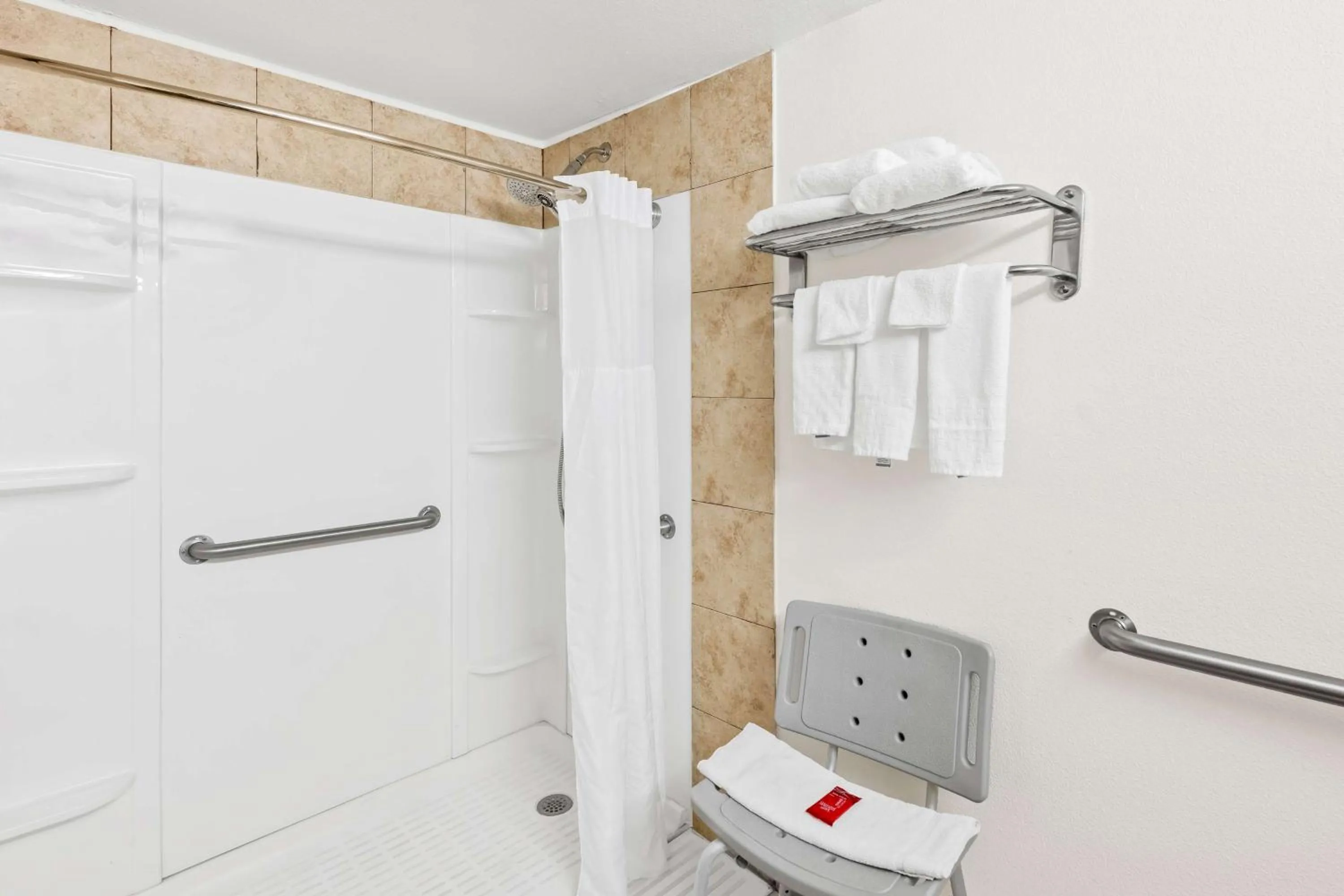 Bathroom in SureStay Plus Hotel by Best Western Lubbock Medical Center