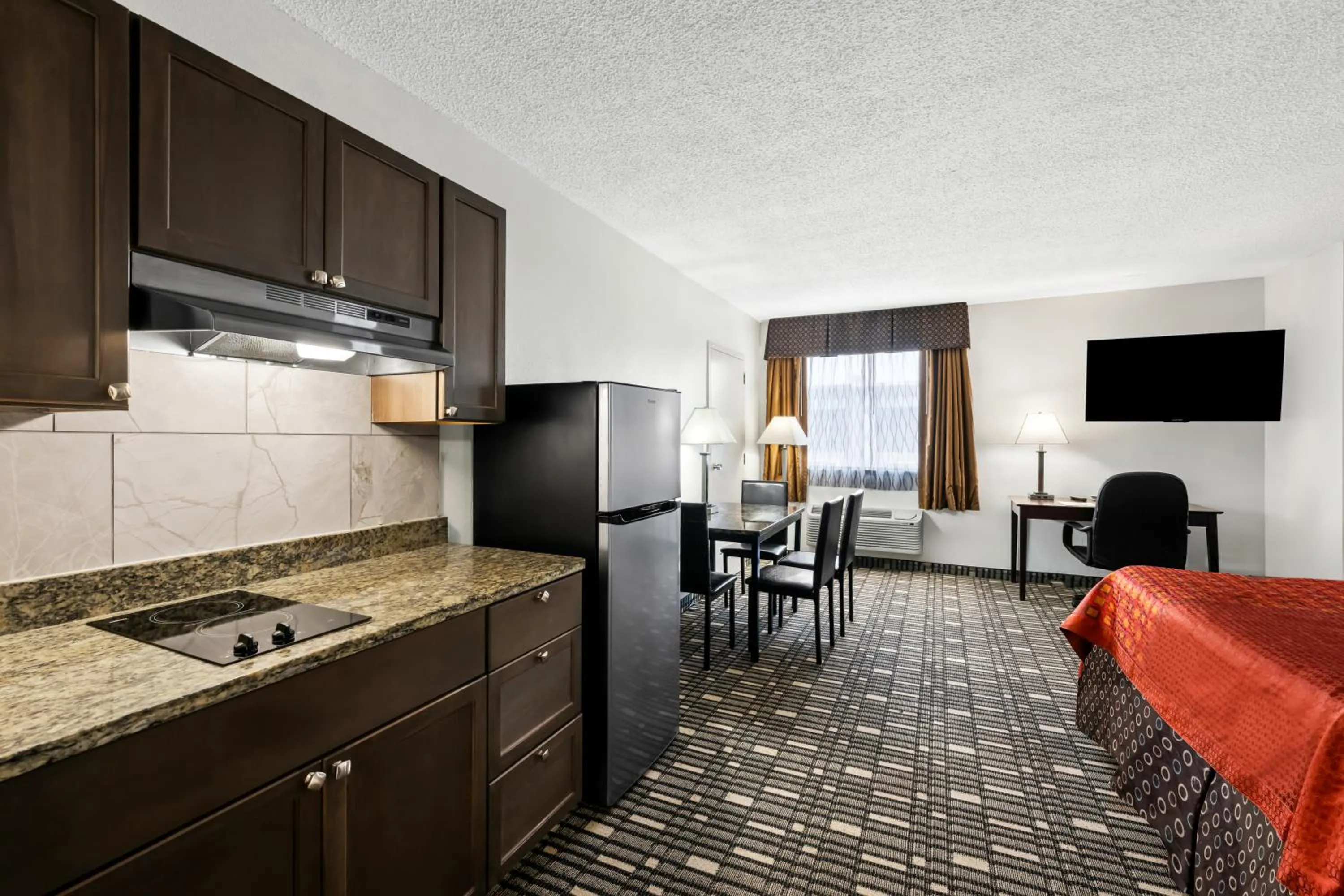 Kitchen or kitchenette in SureStay Plus Hotel by Best Western Lubbock Medical Center