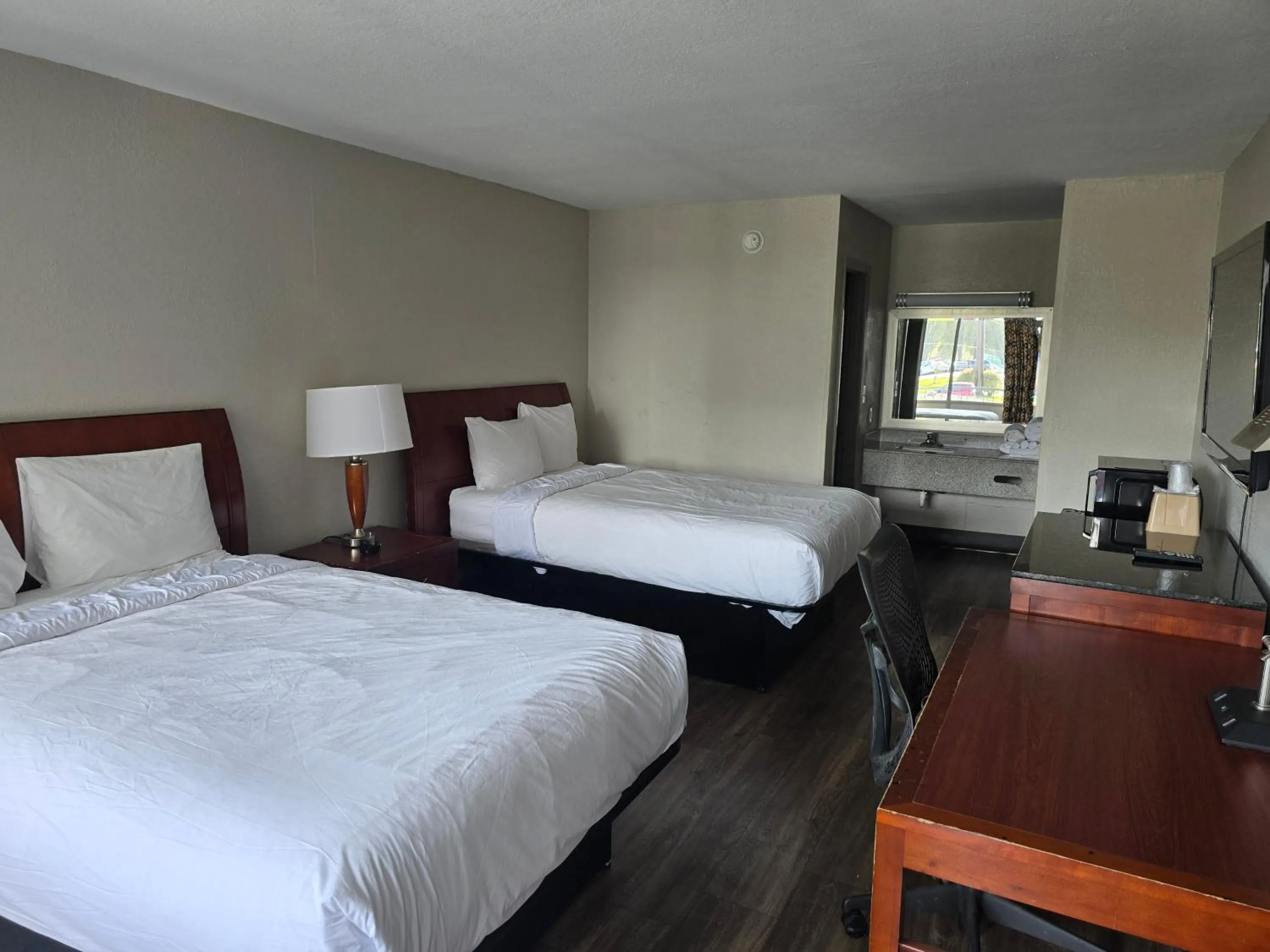 Bed in Days Inn by Wyndham Raleigh South