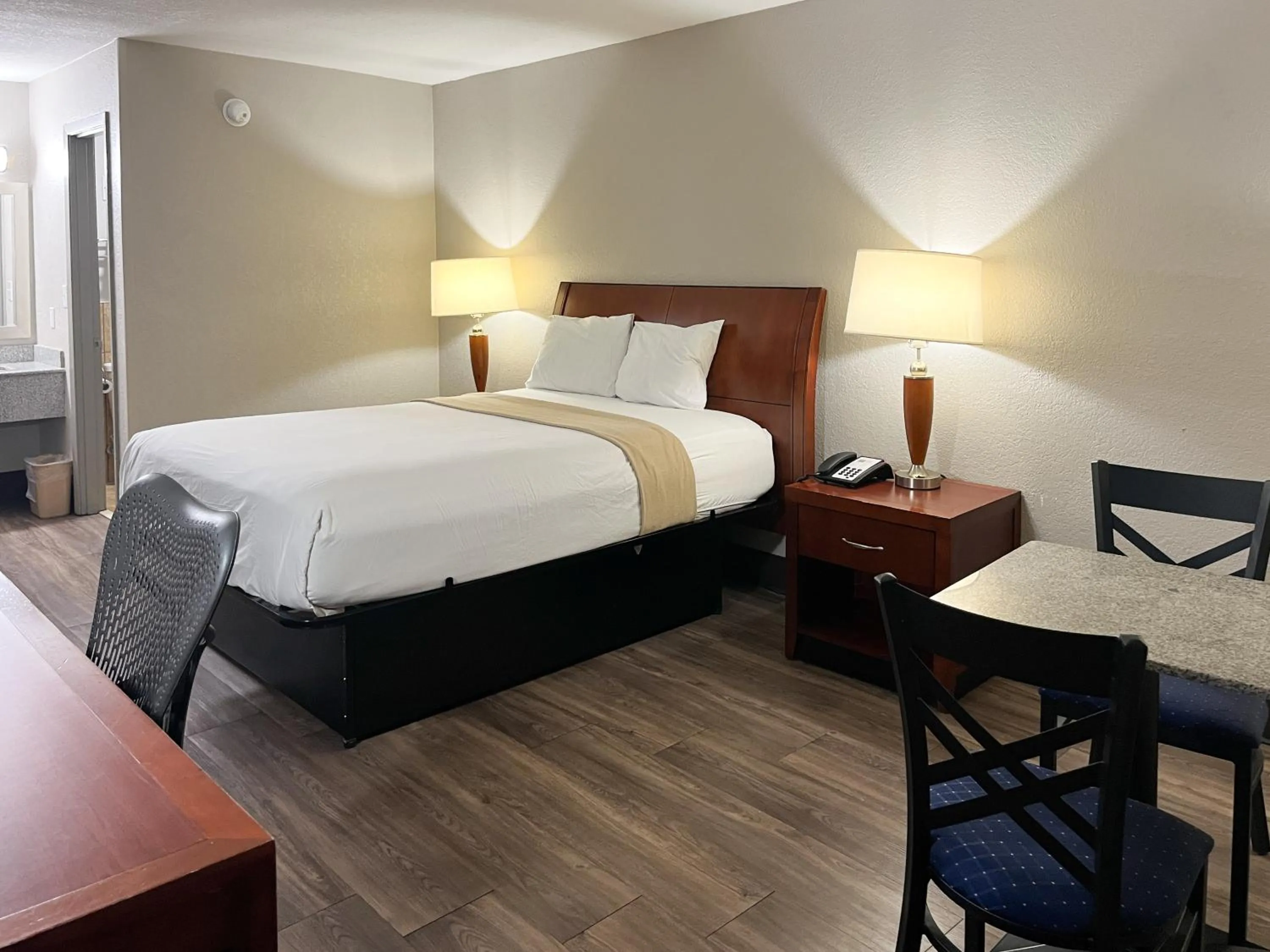 Bed in Motel 6 Raleigh, NC – Downtown South