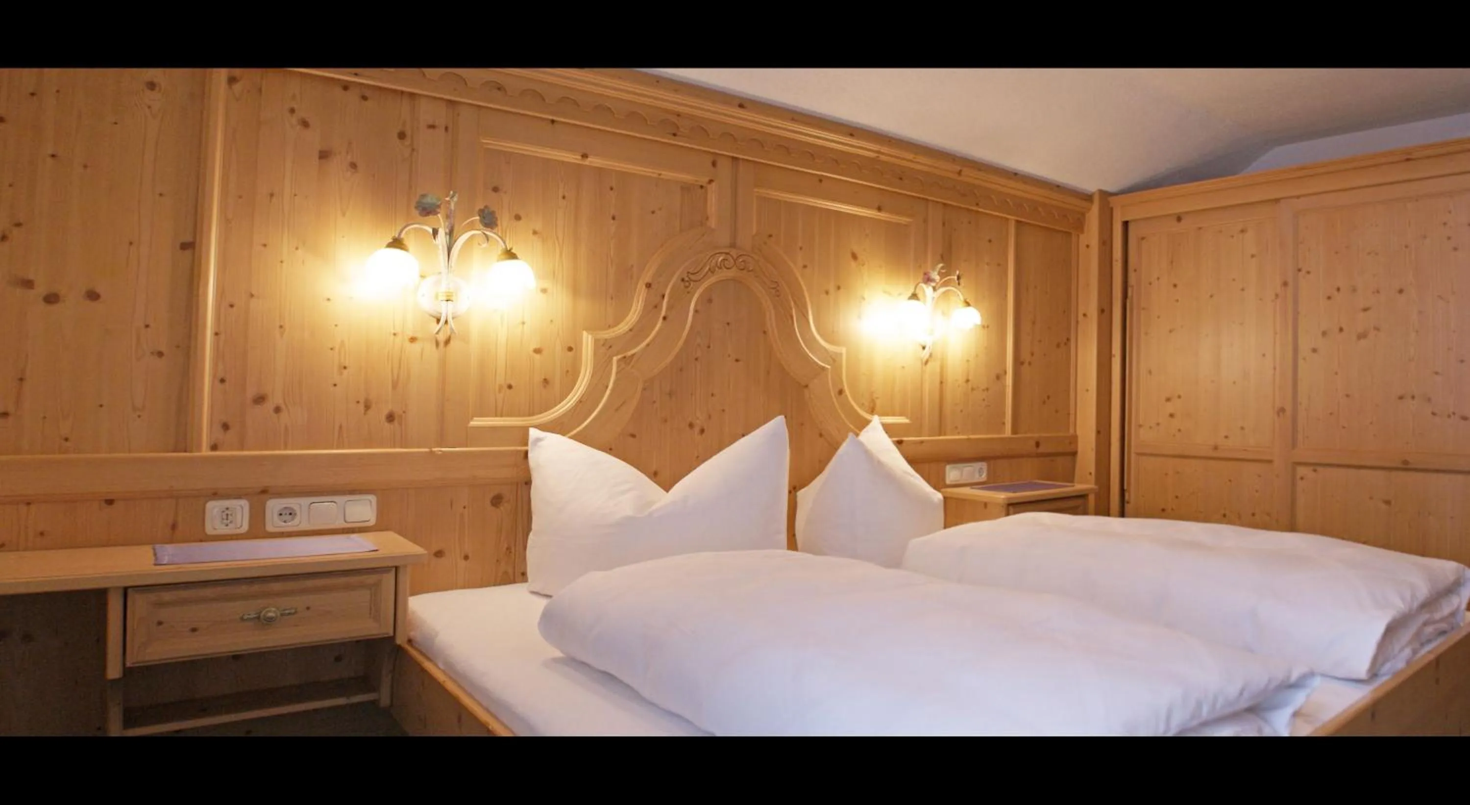 Bed in Sportapart Garni Mallaun