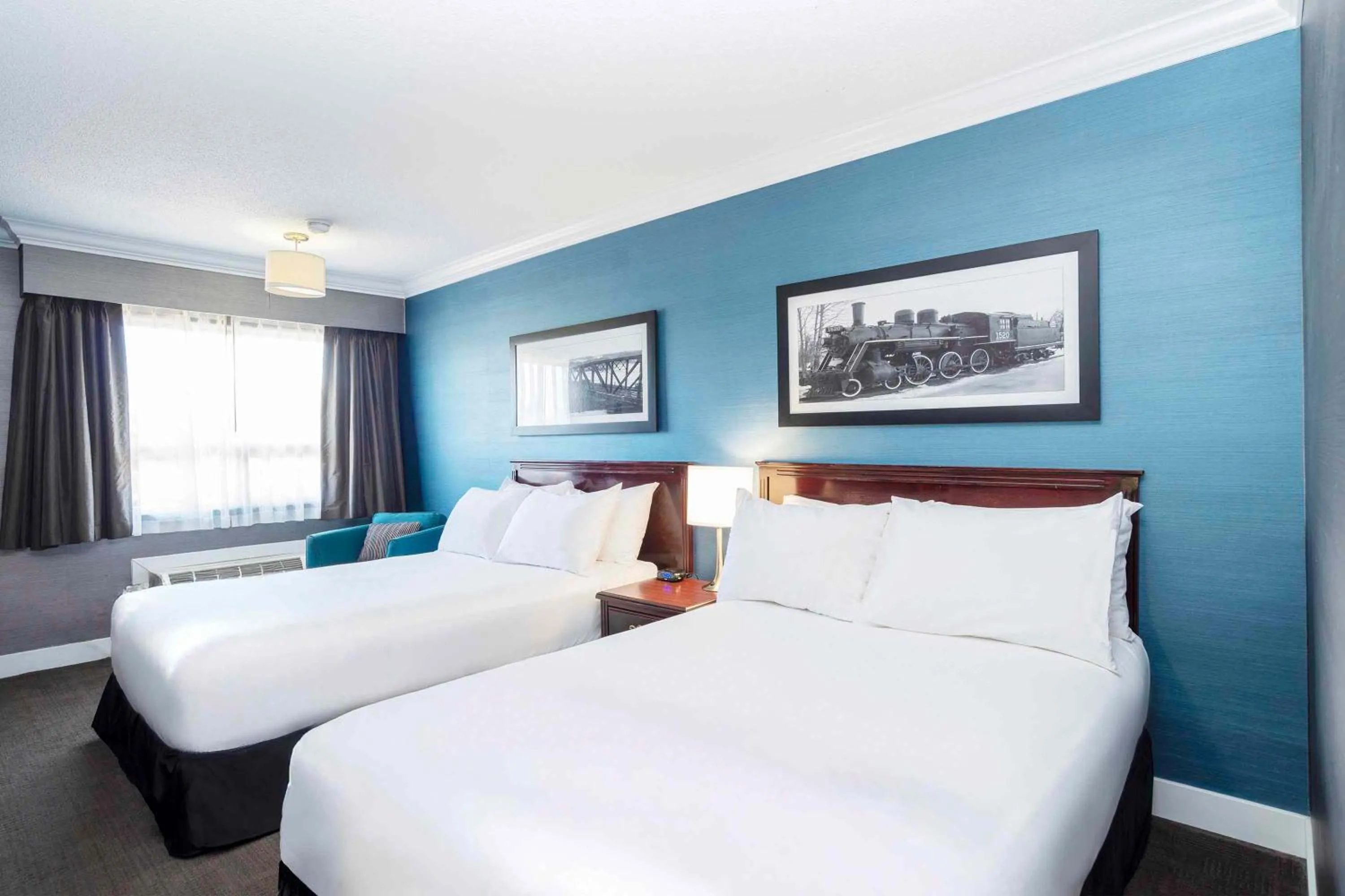 Photo of the whole room, Bed in Sandman Hotel & Suites Prince George