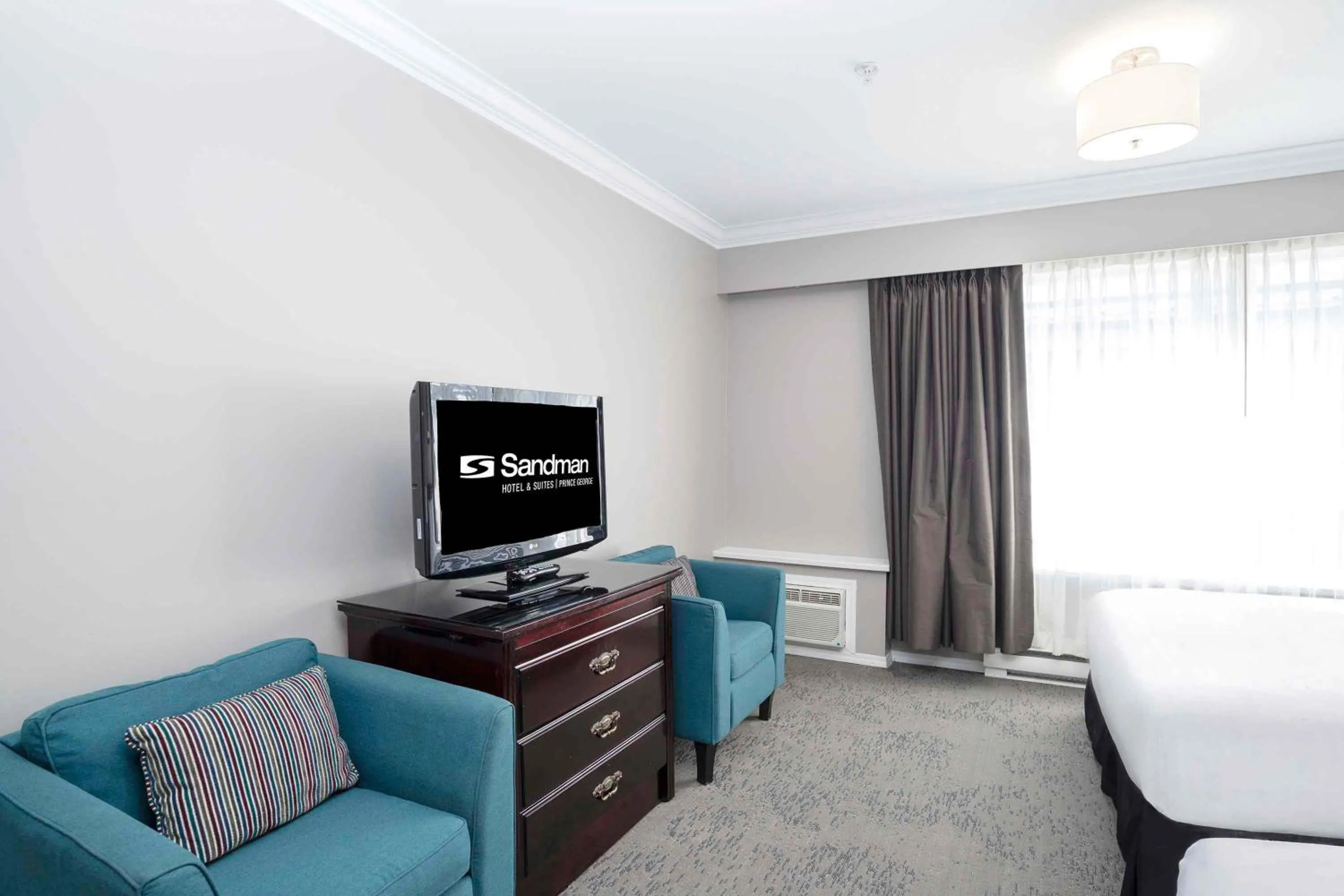 Photo of the whole room, Bed in Sandman Hotel & Suites Prince George