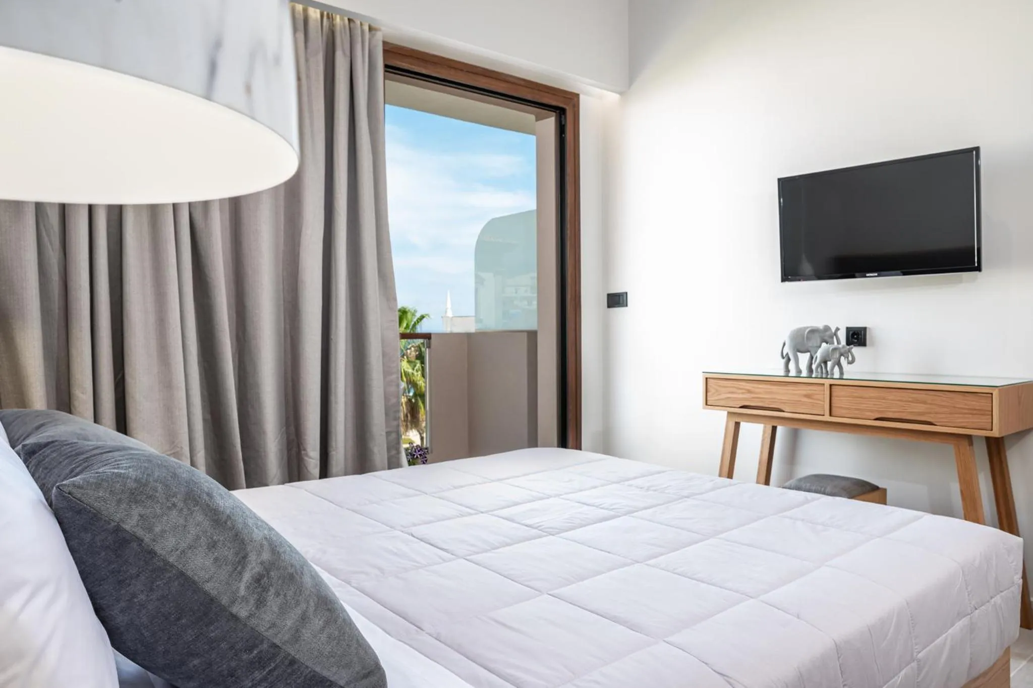 Bed in Alektor Luxury Apartments