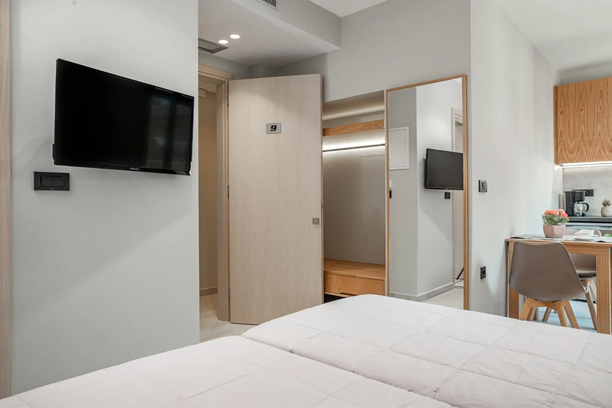 Bed in Alektor Luxury Apartments