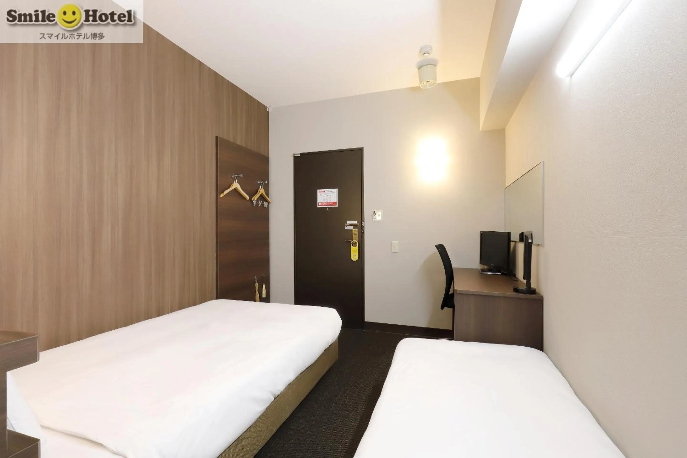 Bed in Smile Hotel Hakata