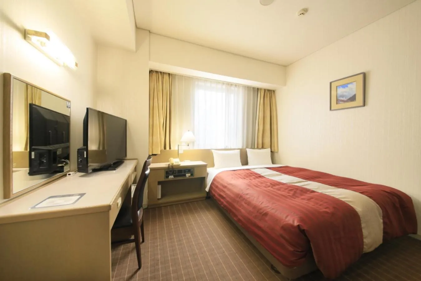 Bed in Hotel Nagano Avenue