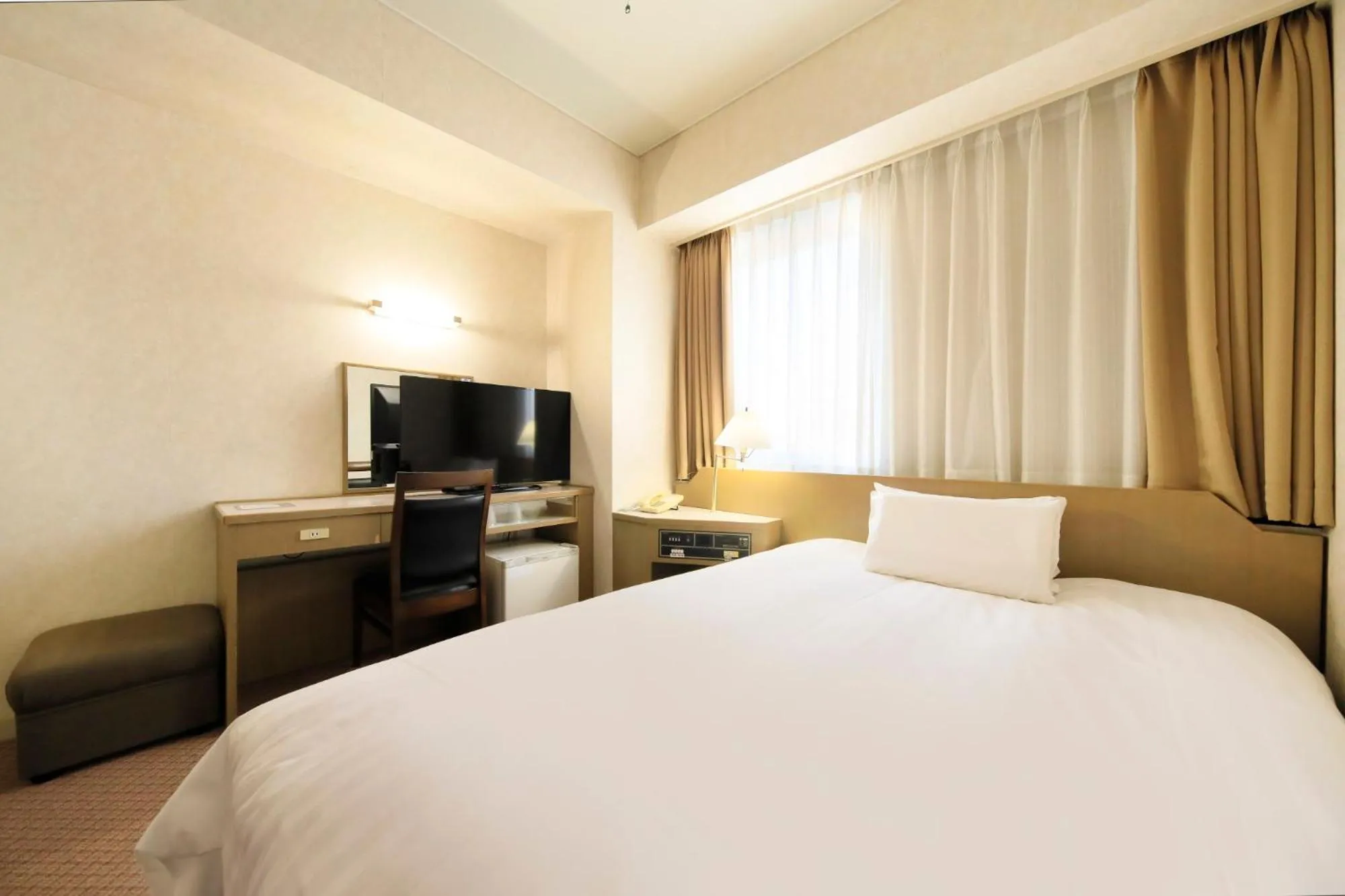 Bed in Hotel Nagano Avenue