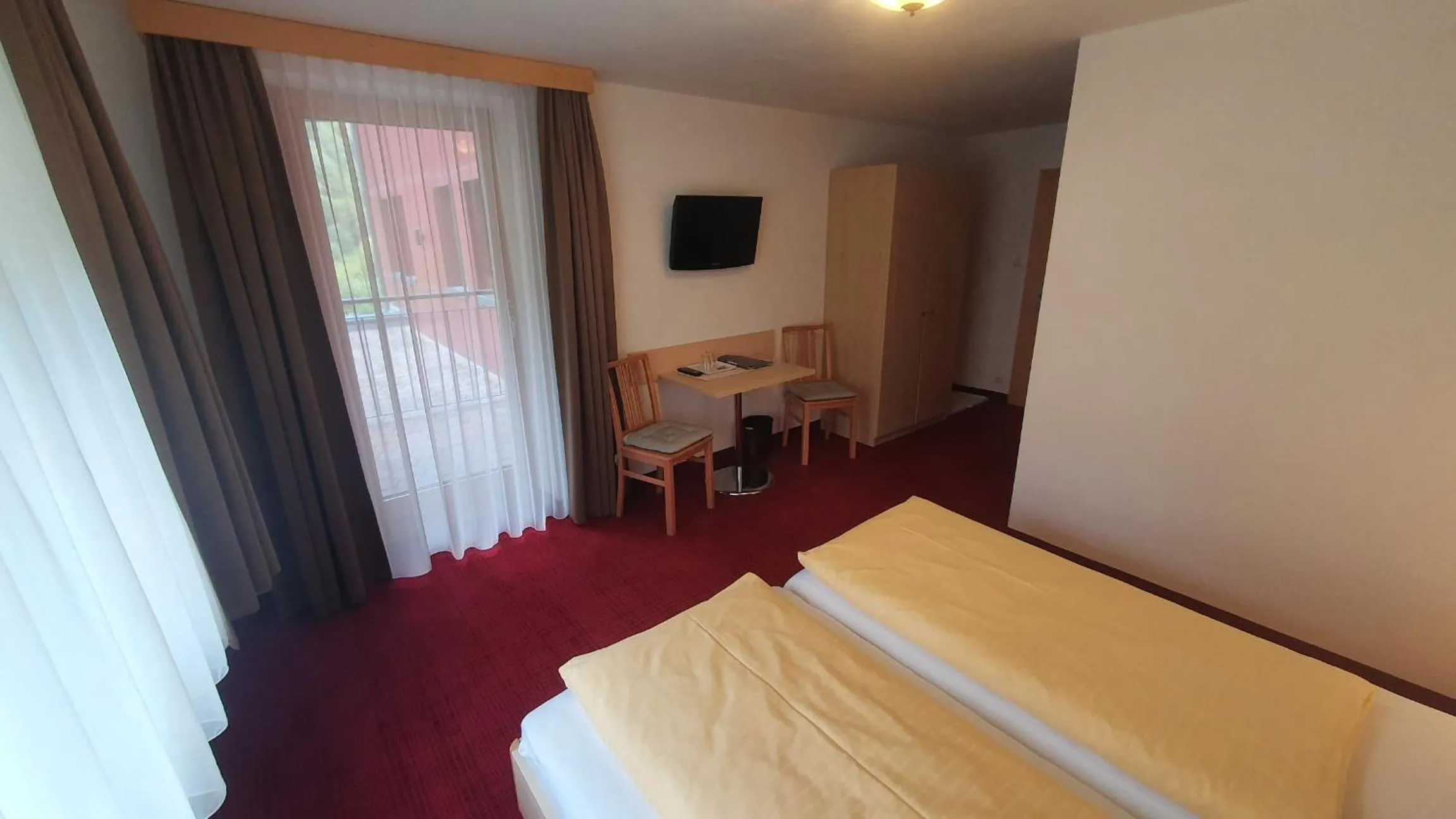 Photo of the whole room, Bed in Hotel Garni Dorfblick