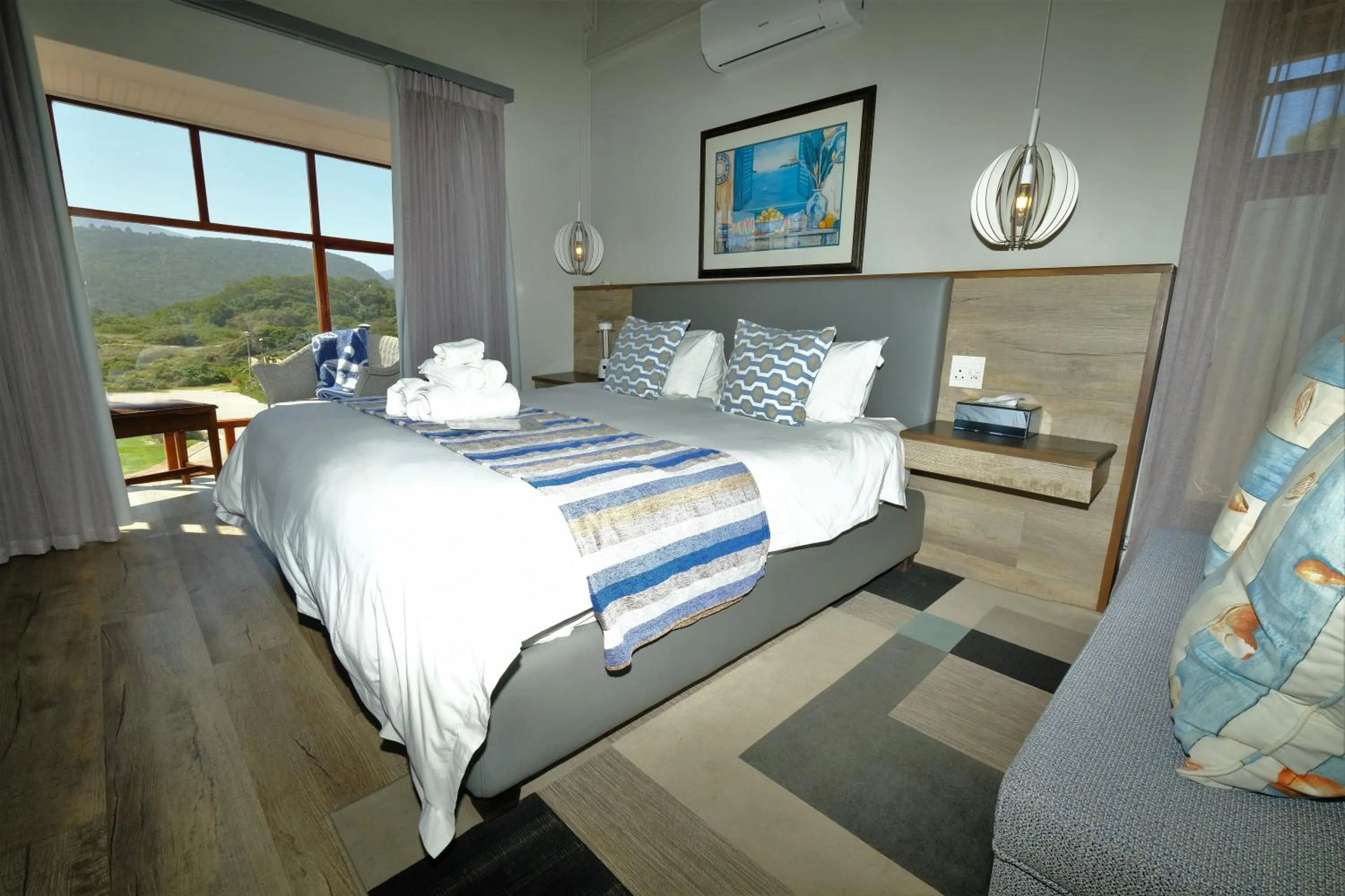 Bed in Dolphin Dunes Guesthouse