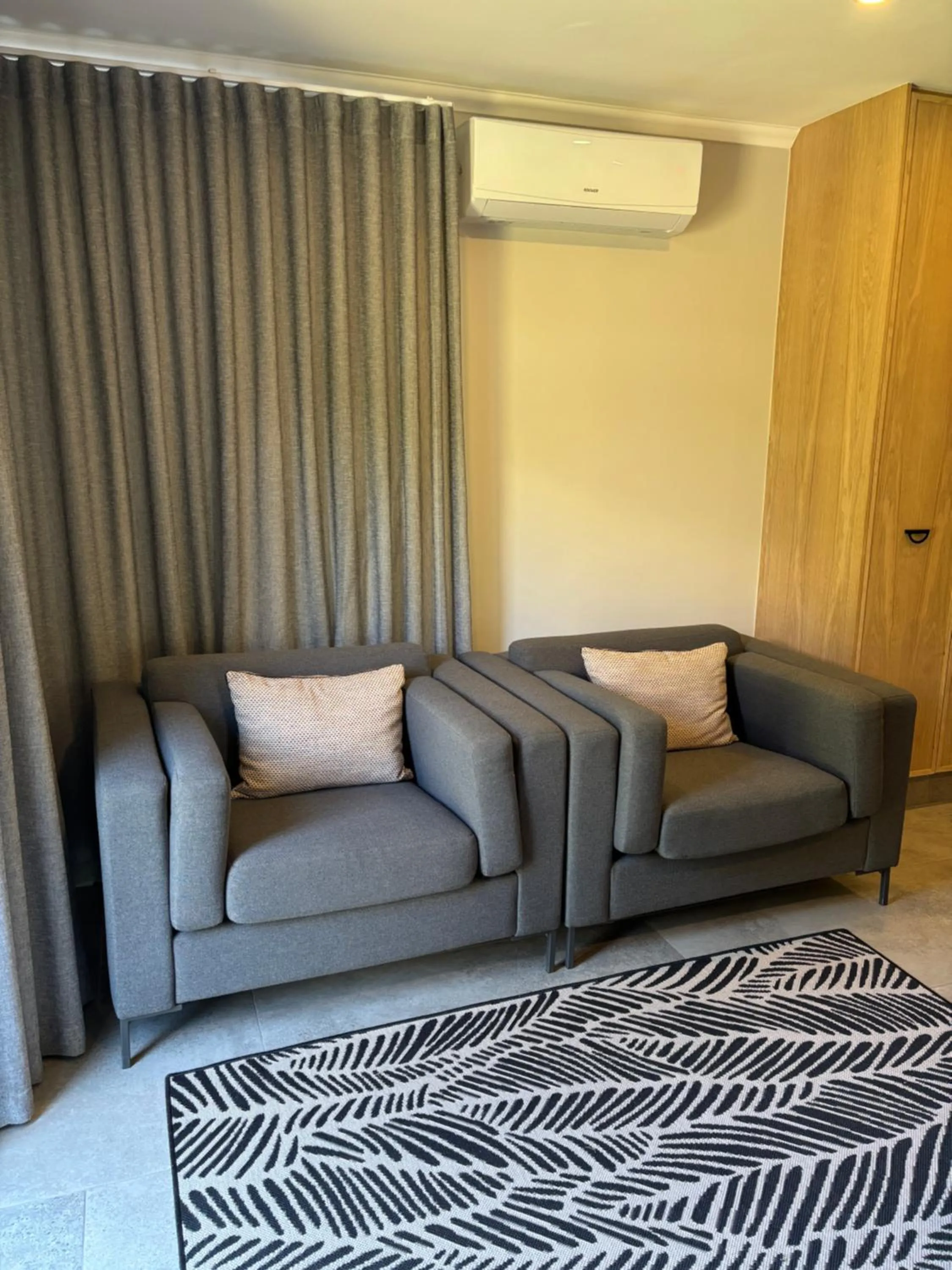 Seating area, Bed in Dolphin Dunes Guesthouse