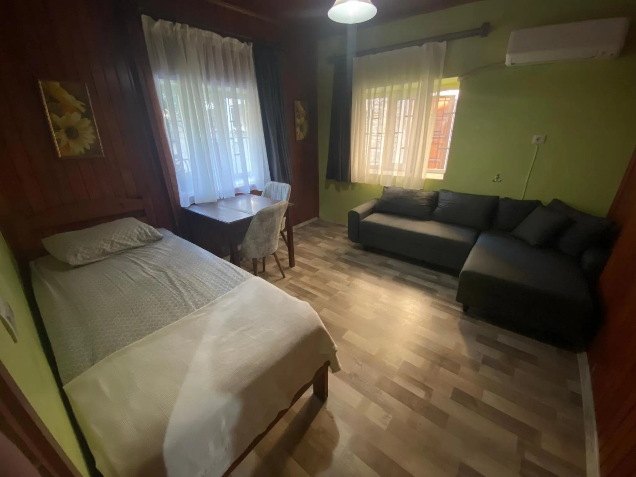 Living room, Bed in Camel Apartment