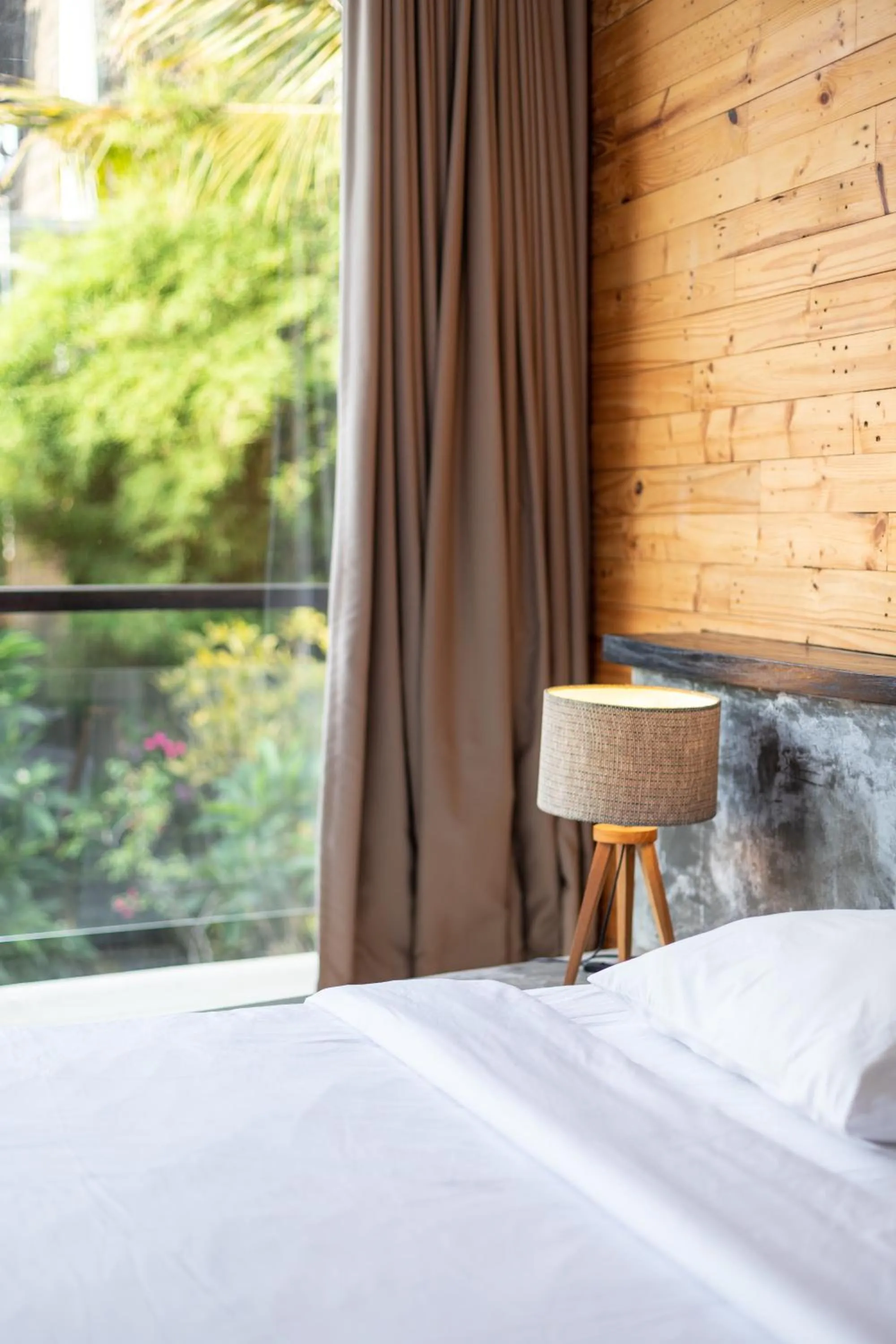 Bed in Balian Surf Villas