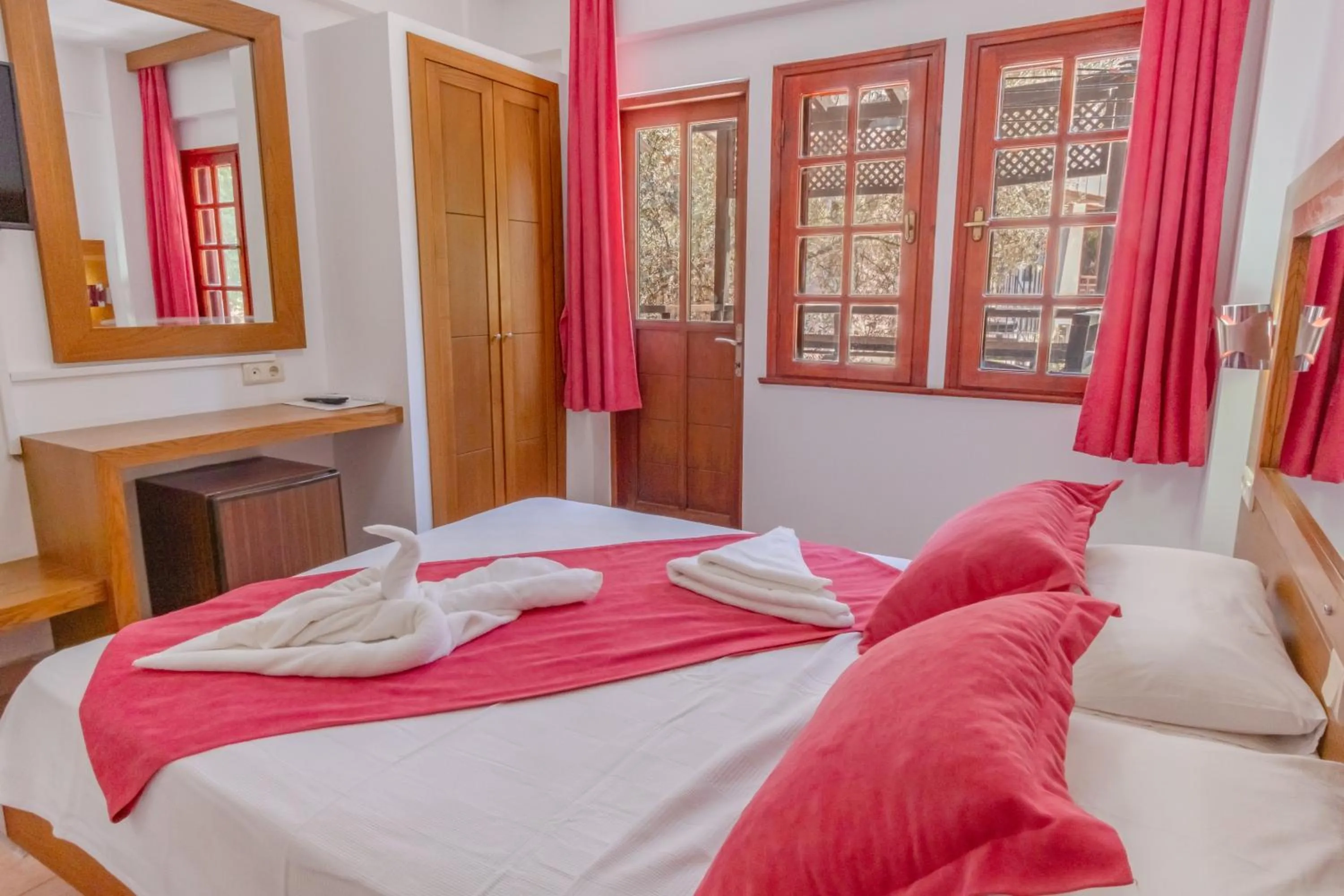 Bed in Club Pink Palace Hotel