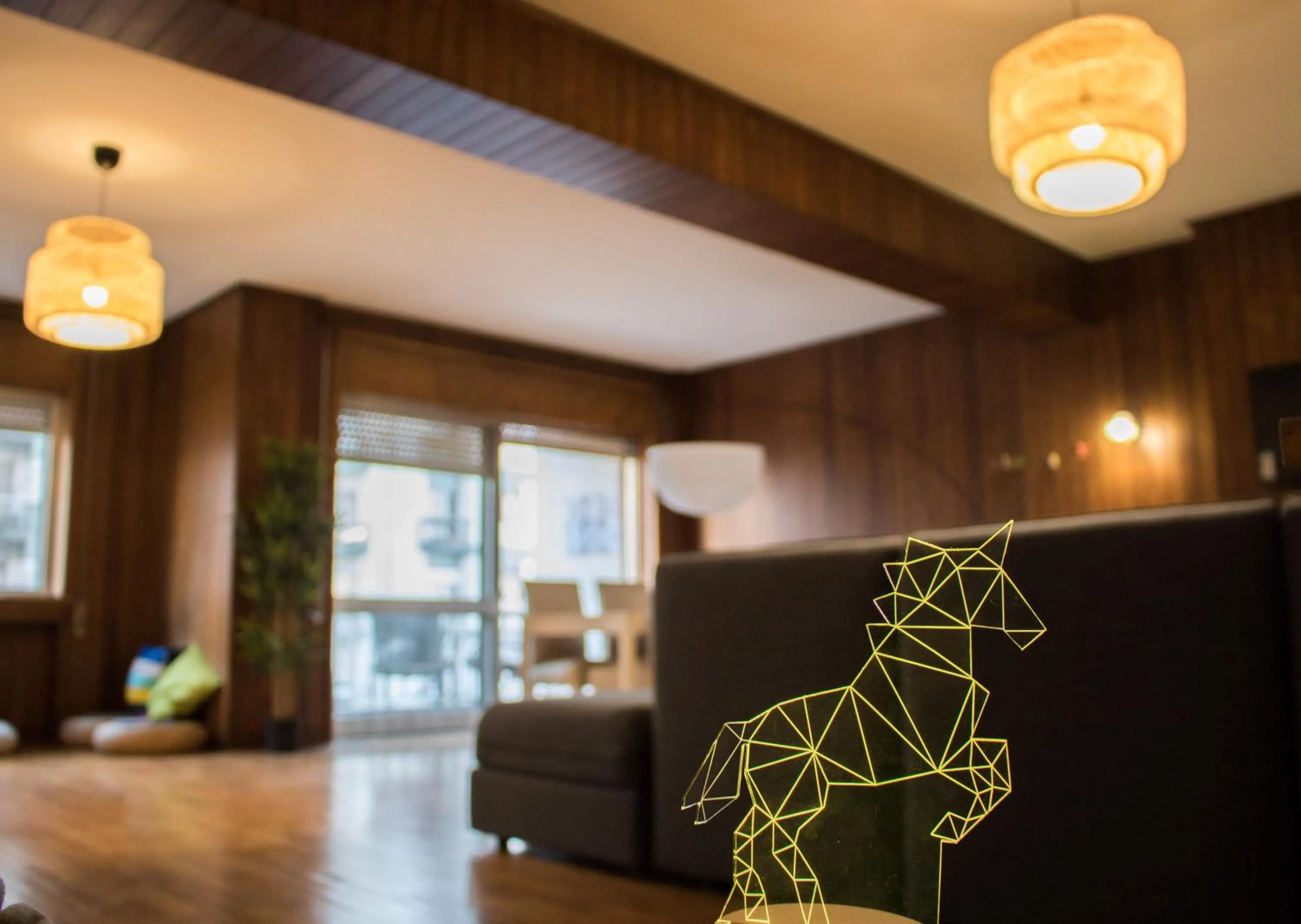 Communal lounge/ TV room in Origami Porto Residência & Hostel