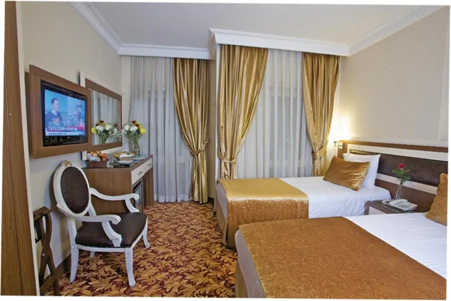 Bed in Grand Anatolia Hotel